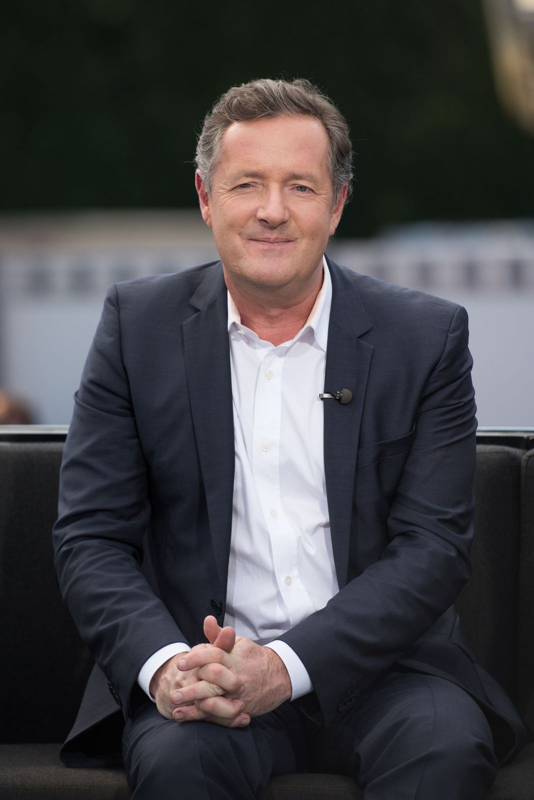 : Piers Morgan visits "Extra" at Universal Studios Hollywood on February 11, 2016 | Getty Images