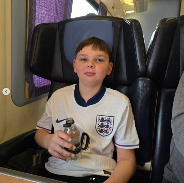 Tony Hudgell is seen smiling while wearing an England shirt in a photo shared on 10 April 2026, offering a glimpse of normality amid his ongoing medical journey. | Source: Instagram/tonyhudgell.bem