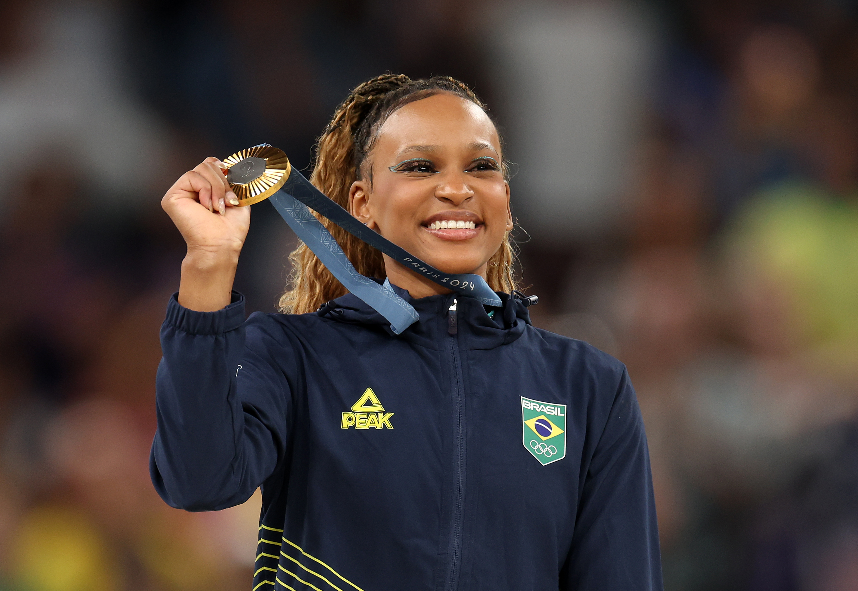 Rebeca Andrade poses on the podium on August 5, 2024 | Source: Getty Images