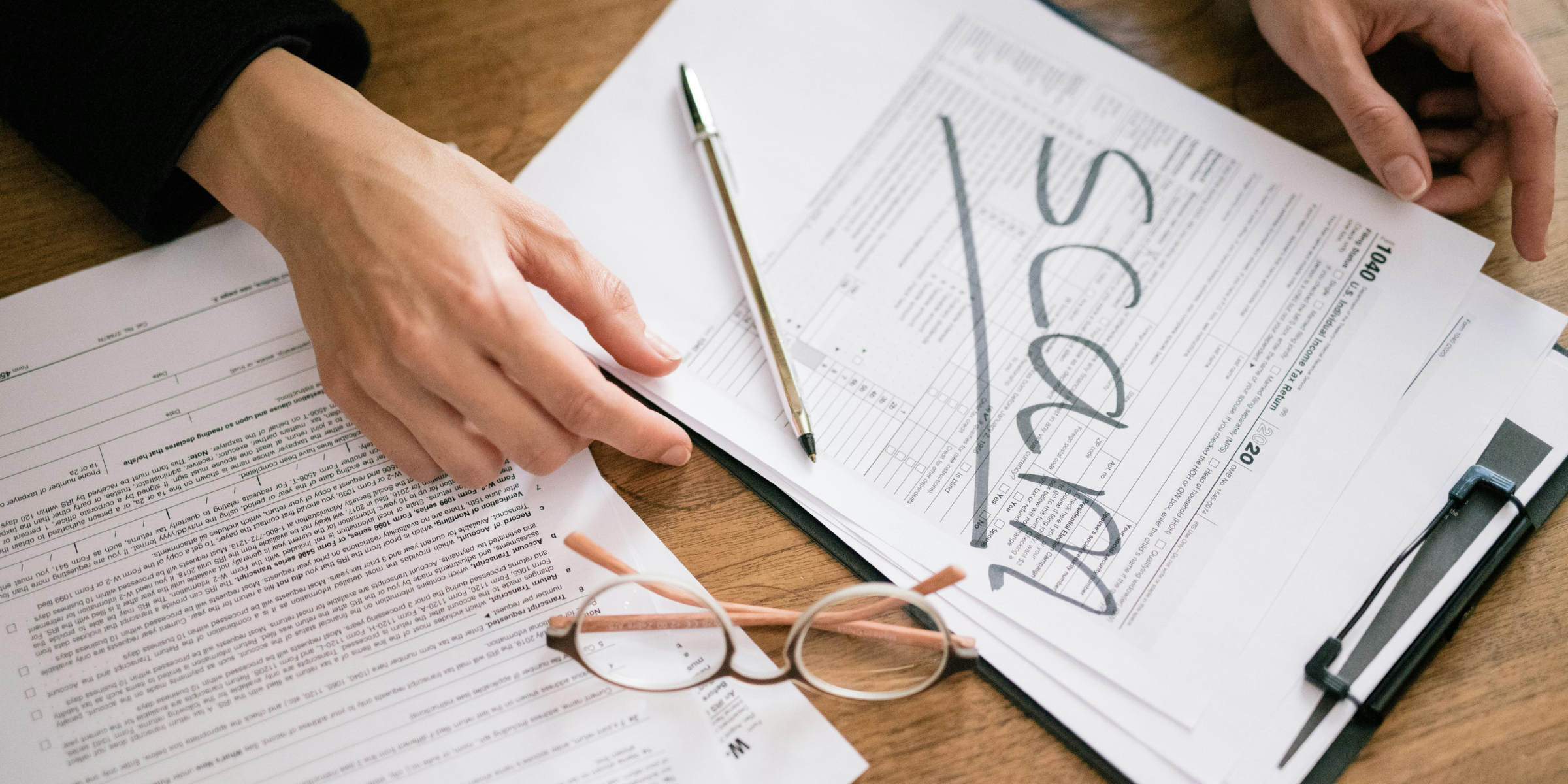 A stack of papers | Source: Pexels