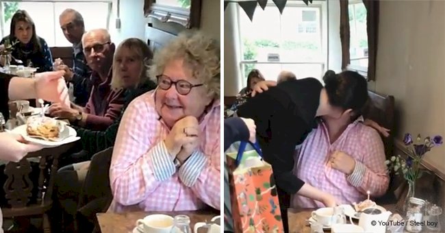 Elderly woman's hilarious reaction to a free birthday cake shows what kindness is all about	