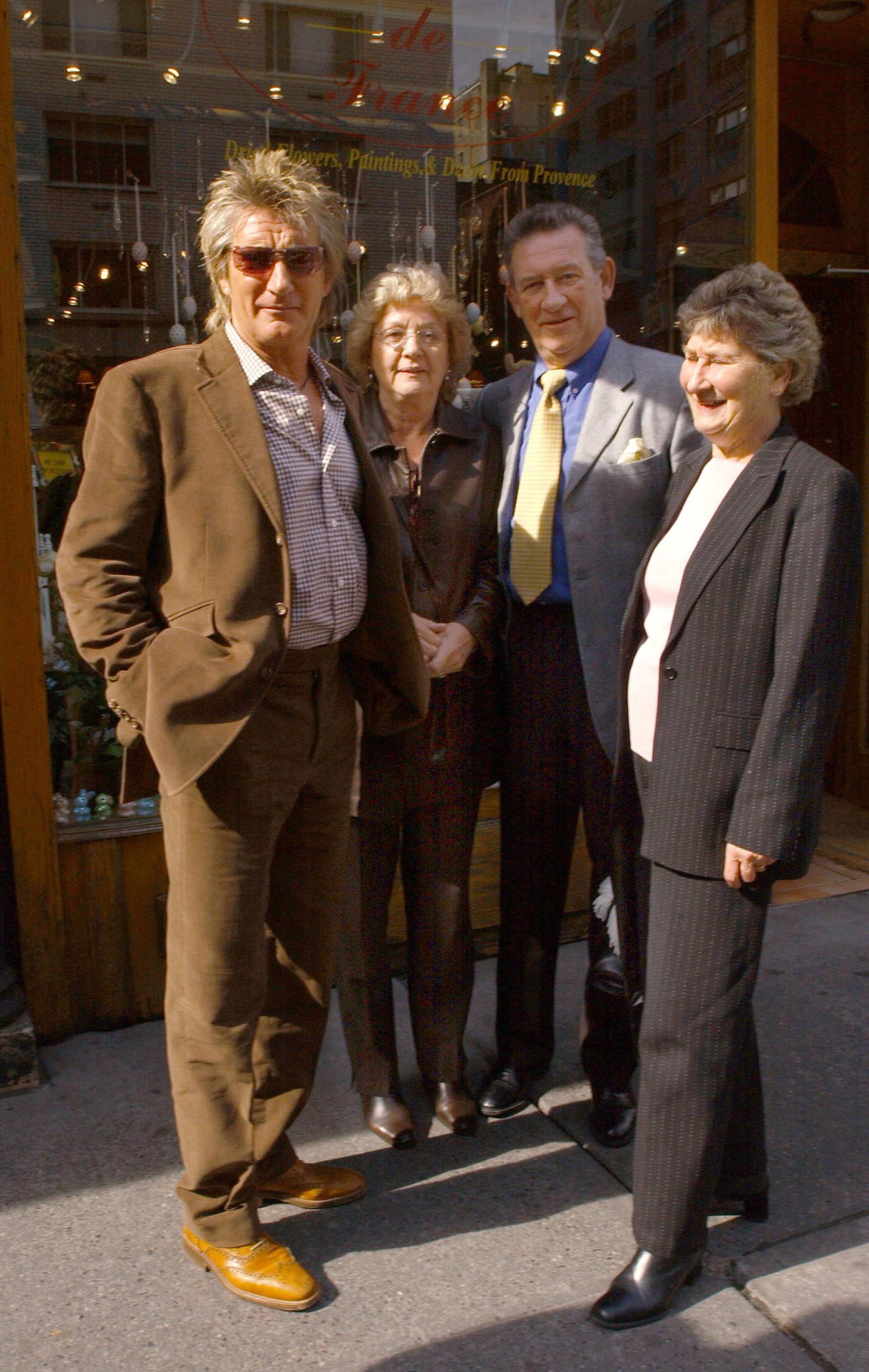 Rod Stewart with his brother Don, Don's wife Pat, and their sister Mary Cady on March 1, 2004, in New York City at the La Goulue Restaurant | Source: Getty Images
