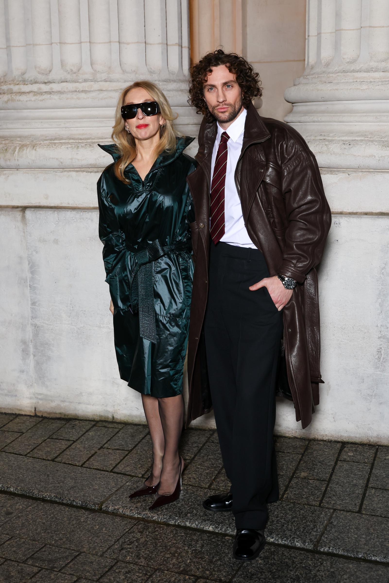 Sam and Aaron Taylor-Johnson at the Saint Laurent Men's Fall/Winter 2026 fashion show as part of Paris Men's Fashion Week held at Bourse du Commerce on 27 January 2026 in Paris, France. | Source: Getty Images
