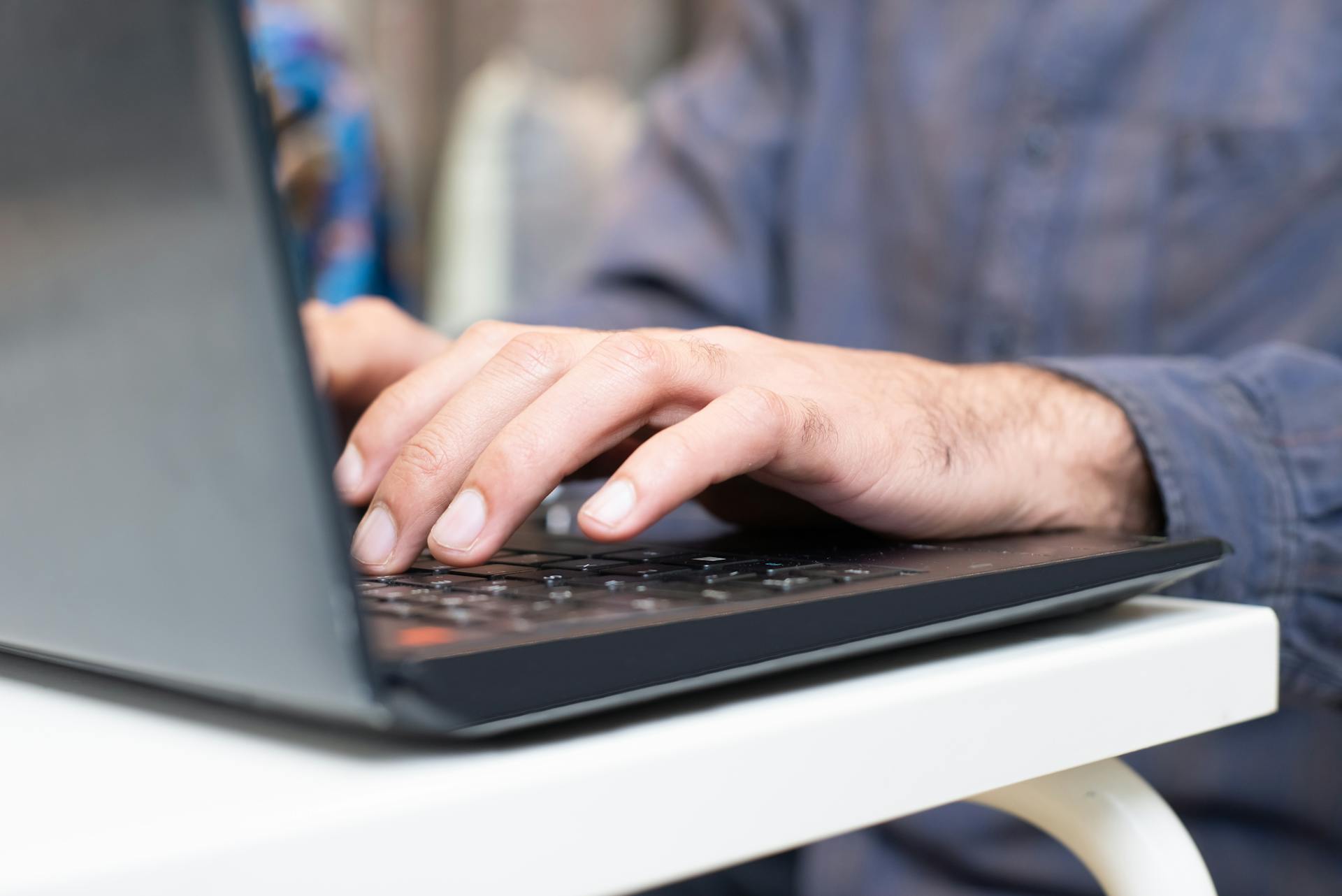 A man working on his laptop | Source: Midjourney