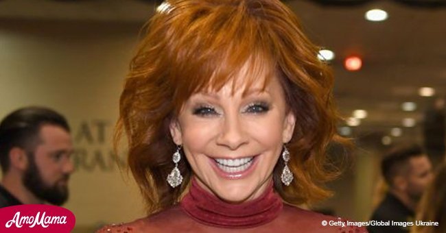 Reba McEntire sizzles in a racy sheer dress she wore 25 years ago to perform 'Does He Love You'