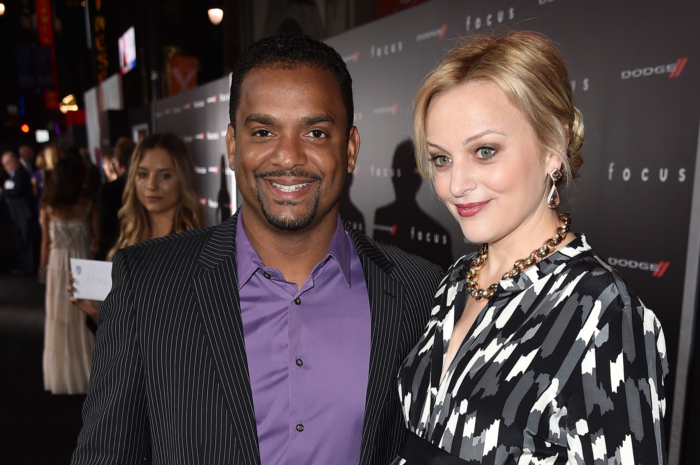 Actor Alfonso Ribeiro (L) and wife Angela Unkrich attend the premiere of Warner Bros. Pictures' "Focus" at TCL Chinese Theatre | Photo: Getty Images