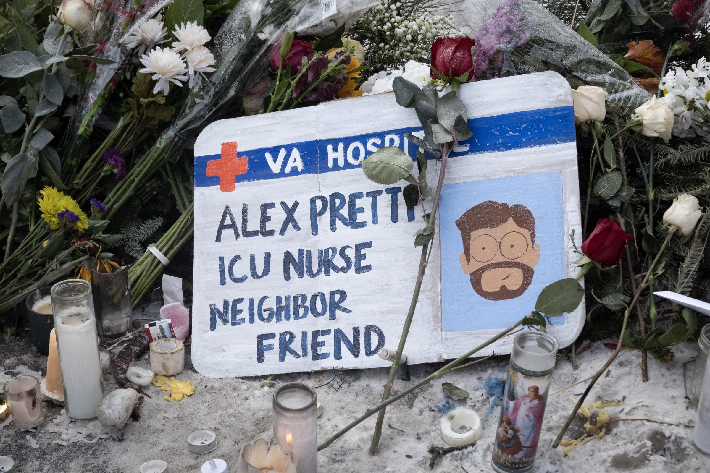 Flowers and candles make up a memorial to Alex Pretti on January 25, 2026 in Minneapolis, Minnesota | Source: Getty Images