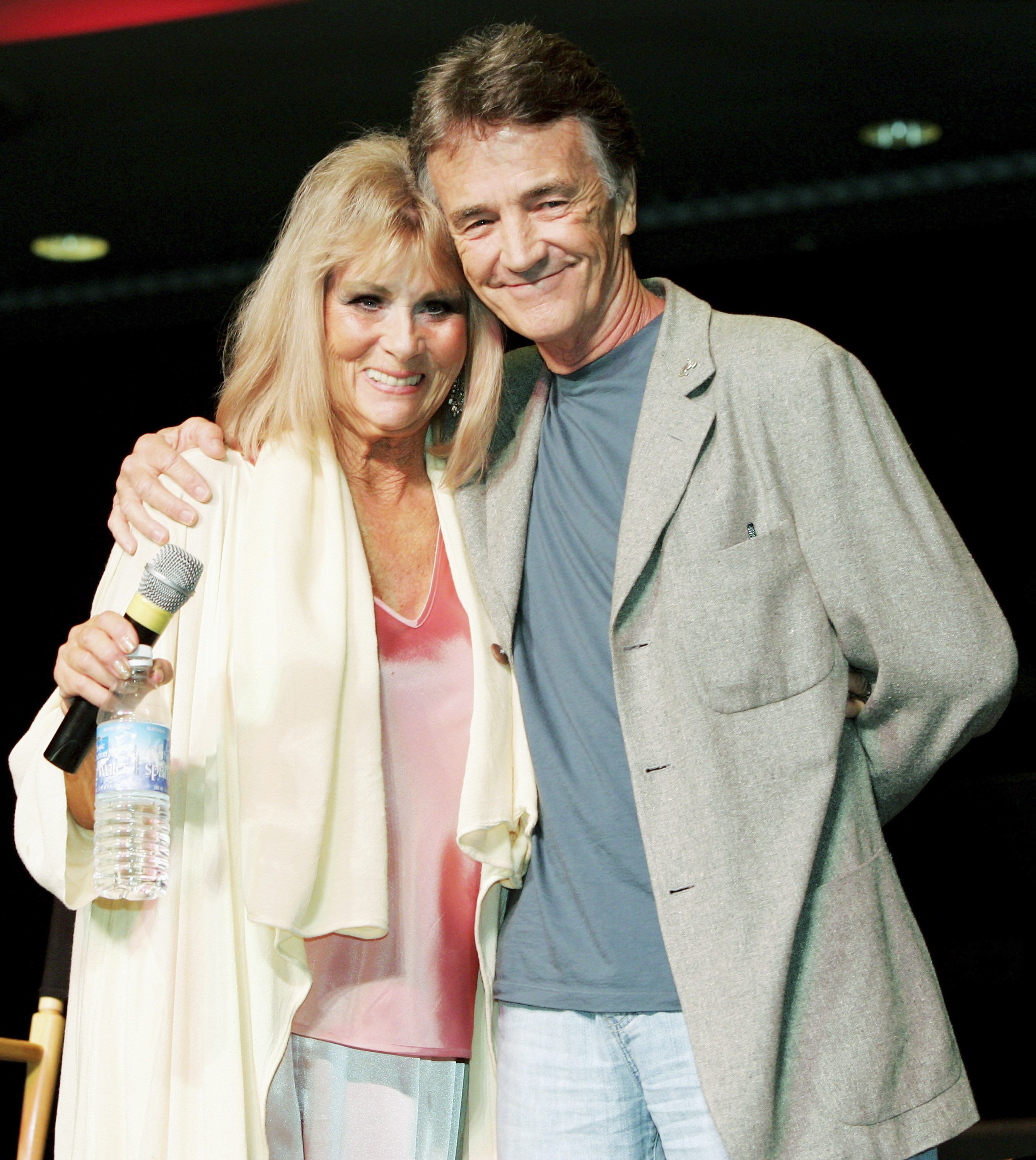 Grace Lee Whitney, who played Janice Rand in the original "Star Trek" television series and films, and actor Robert Walker Jr, who played the character Charlie Evans pose at the Star Trek convention at the Las Vegas Hilton August 11, 2005, in Las Vegas, Nevada | Photo: Ethan Miller/Getty Images