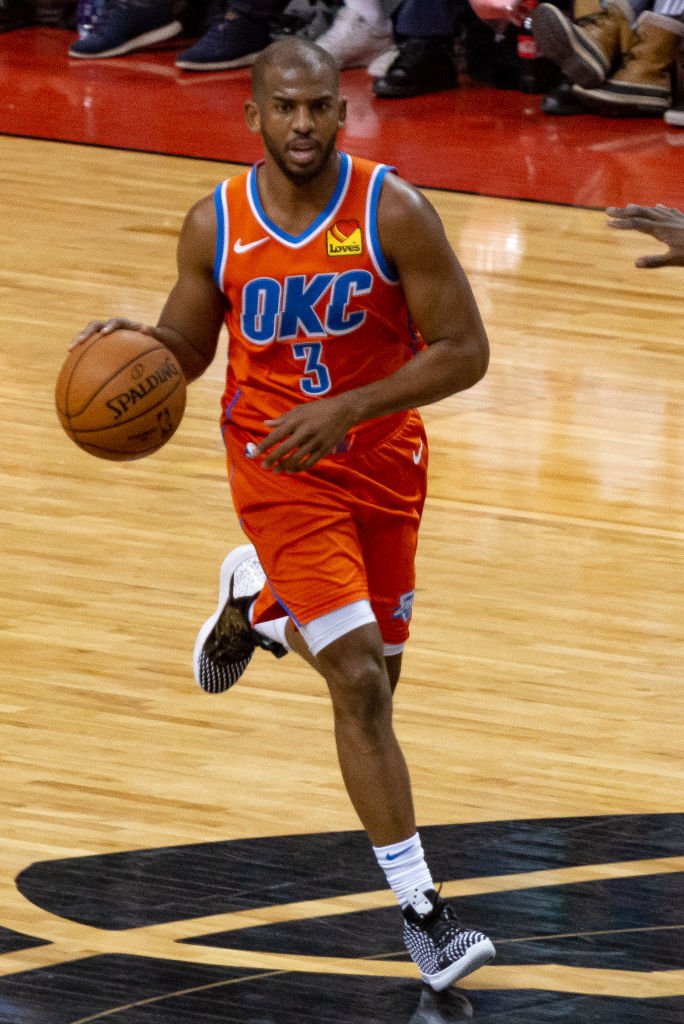 Oklahoma City Thunder player, Chris Paul, runs with the basketball during a game with the Toronto Raptors on December 29, 2019, in Toronto, Canada | Source: Anatoliy Cherkasov/NurPhoto via Getty Images