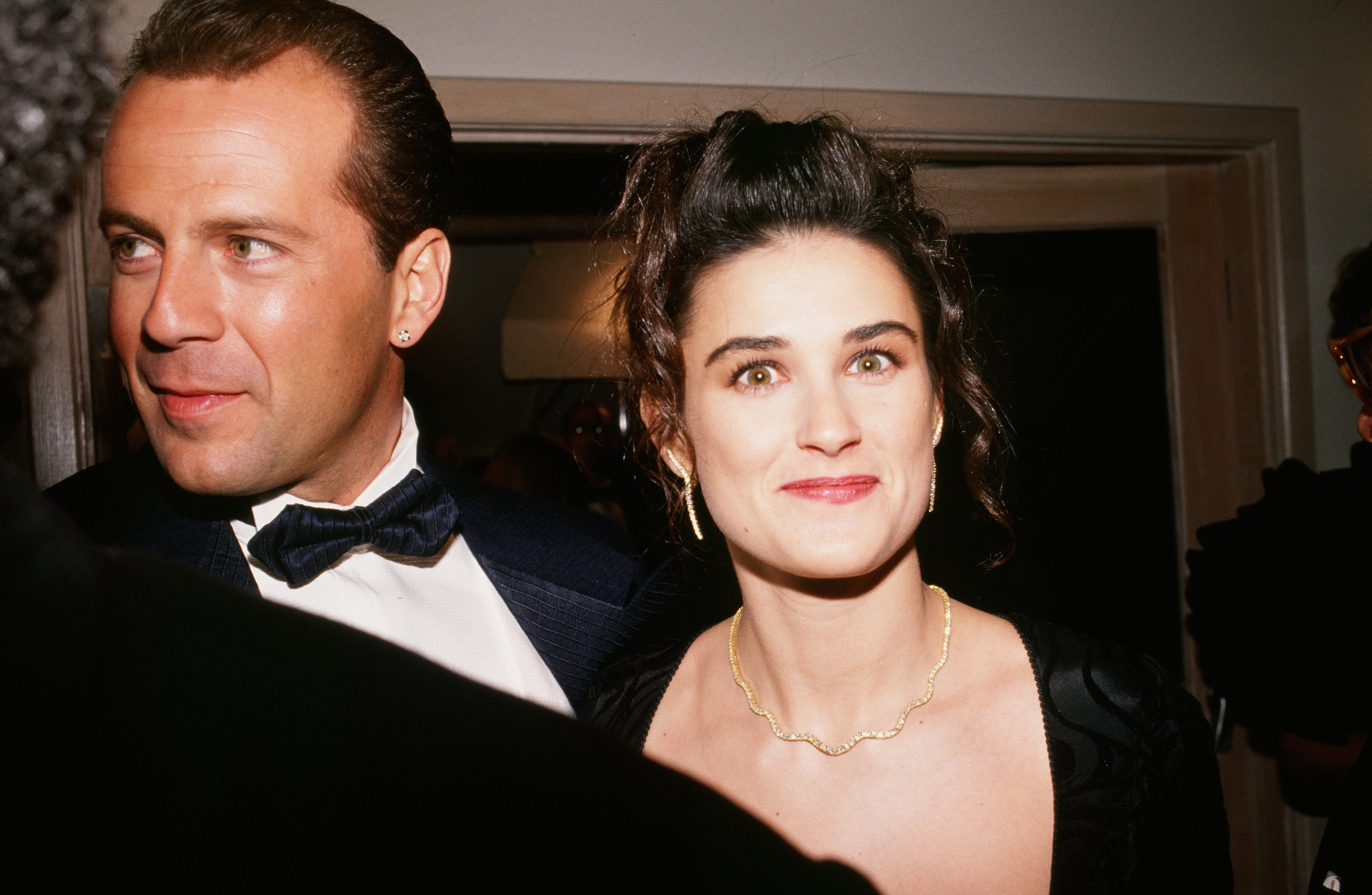 Bruce Willis and Demi Moore arrive at the 1989 West Hollywood, California, Irving "Swifty" Lazar Oscar Party held at Spago. | Source: Getty Images.