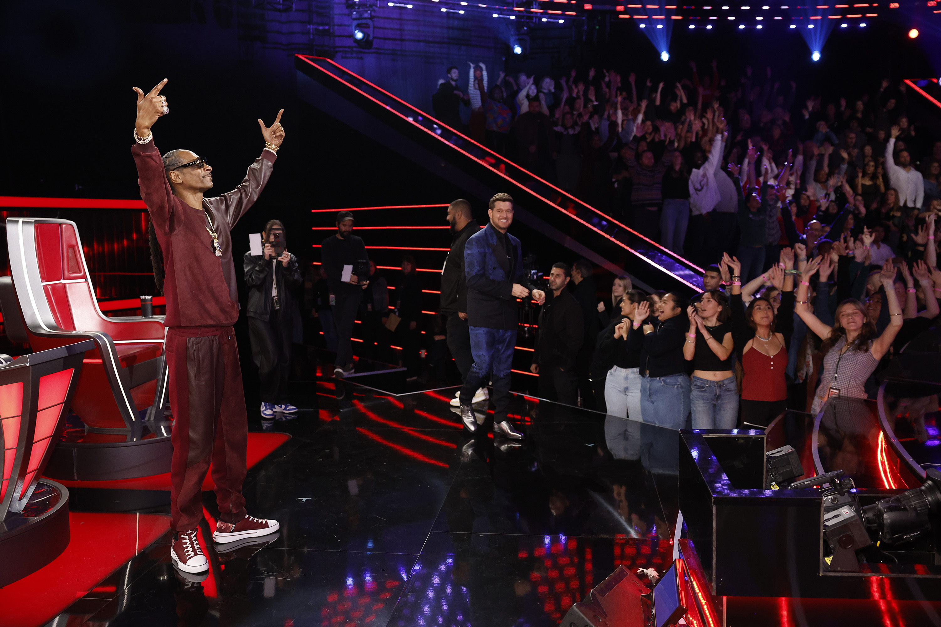 "The Voice" coaches: Snoop Dogg and Michael Bublé engaging with the audience on December 3, 2024 | Source: Getty Images