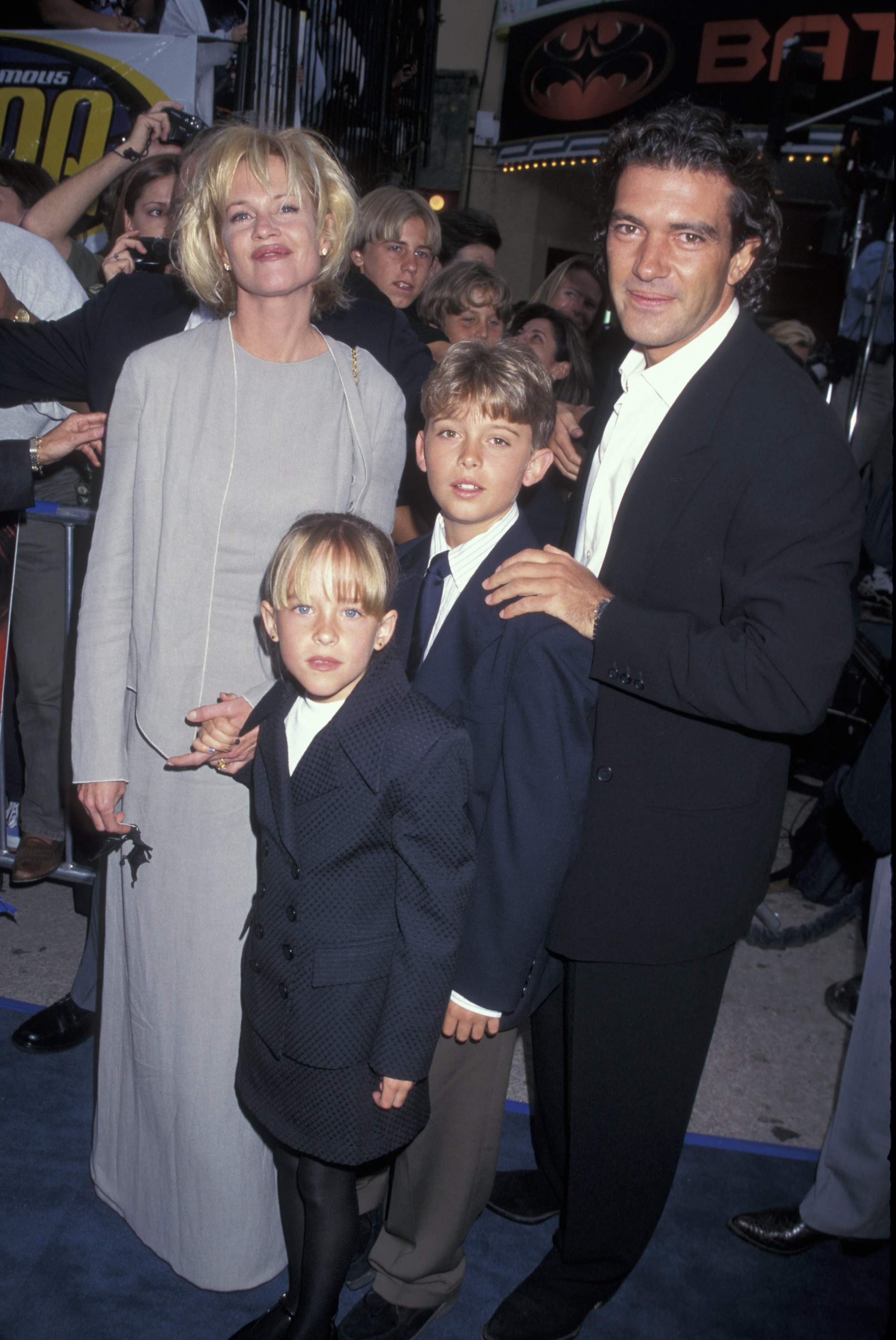 Melanie Griffith, Dakota Johnson, Alexander Bauer, and Antonio Banderas at the Los Angeles premiere of "Batman & Robin," 1997 | Source: Getty Images