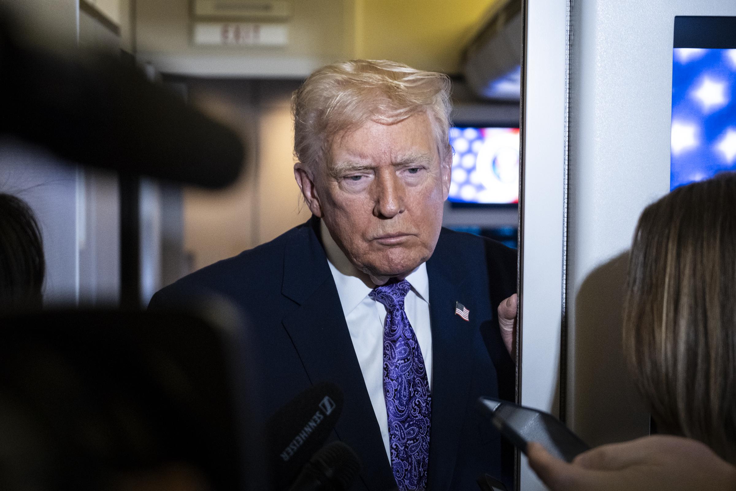 President Donald Trump speaking to the press after spending the Thanksgiving holiday at Mar-A-Lago Resort in Florida | Source: Getty Images