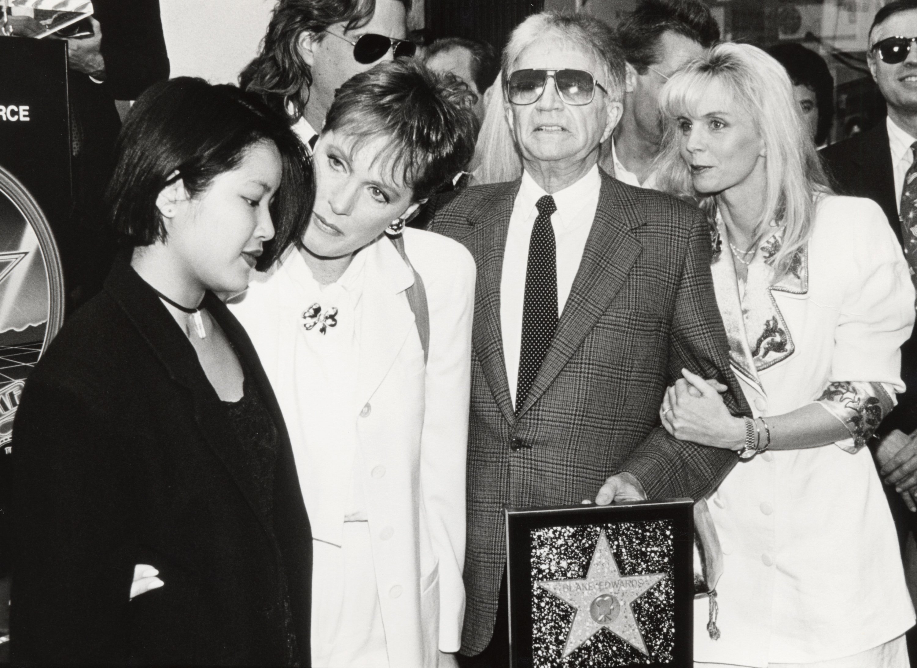 Amy Edwards, Julie Andrews, Blake Edwards, and Jennifer Edwards at a ceremony honoring Blake with a Star on the Hollywood Walk of Fame on April 3, 1991. | Source: Jim Smeal/Ron Galella Collection/Getty Images