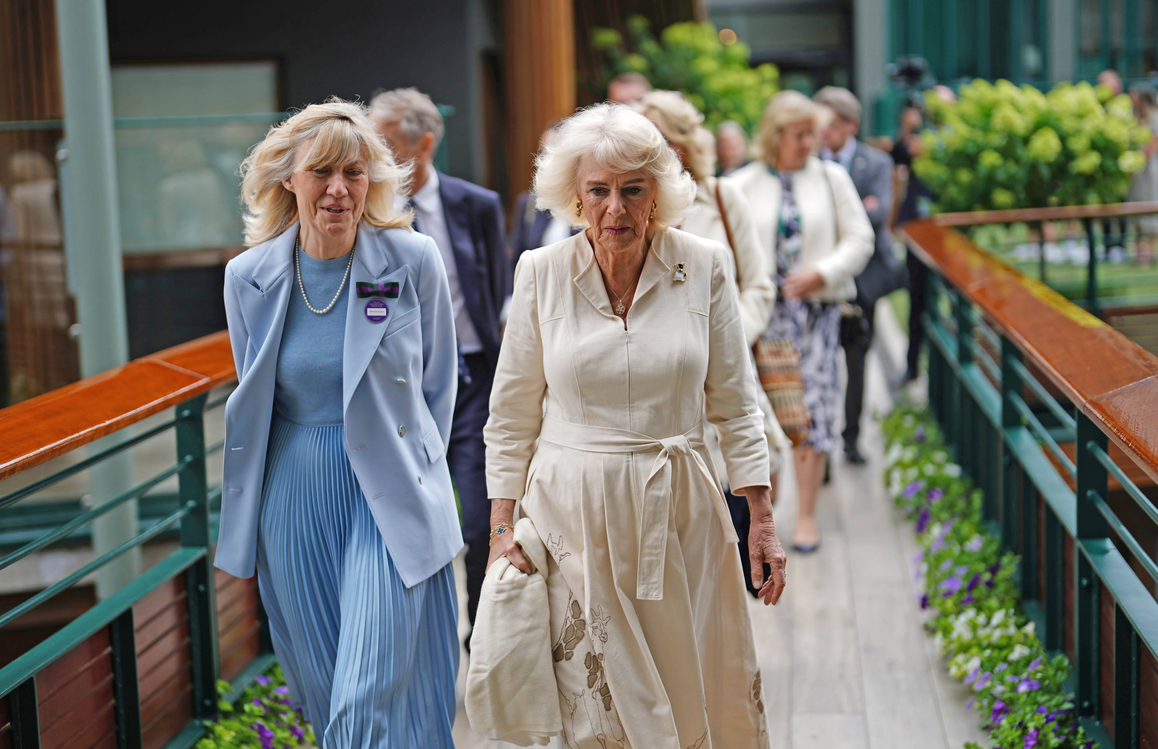 Queen Camilla with Debbie Jevans chair of the All England Lawn Tennis Club on July 10, 2024, in London, England. | Source: Getty Images