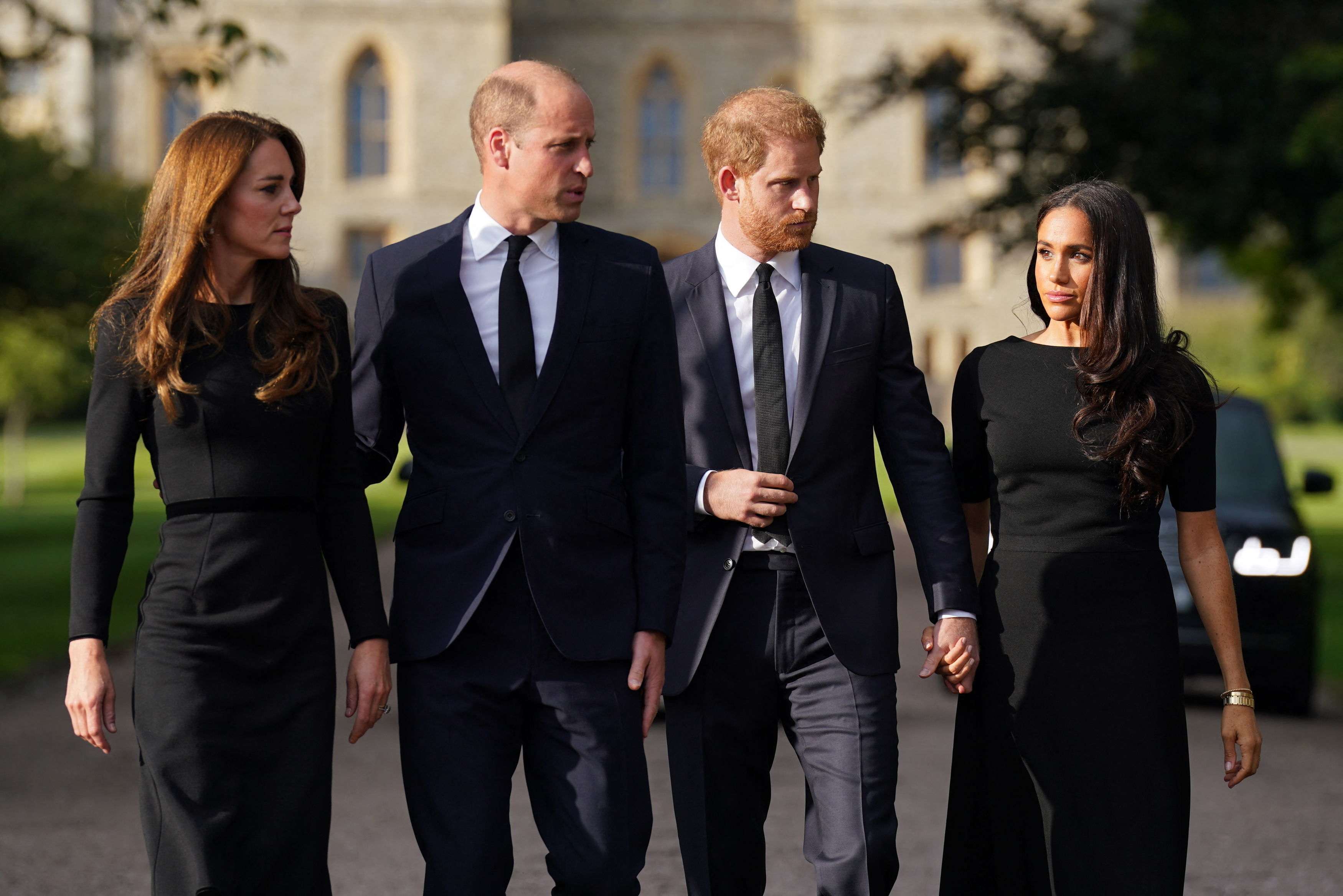 Princess Catherine, Prince William, Prince Harry, and Meghan Markle walk on September 10, 2022, at Windsor Castle, England. | Source: Getty Images