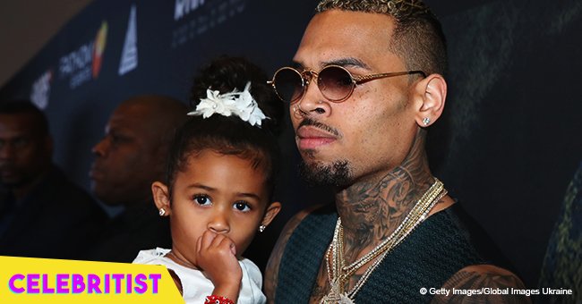 Chris Brown's daughter Royalty snatches hearts in floral dress & matching purse in pic with mom