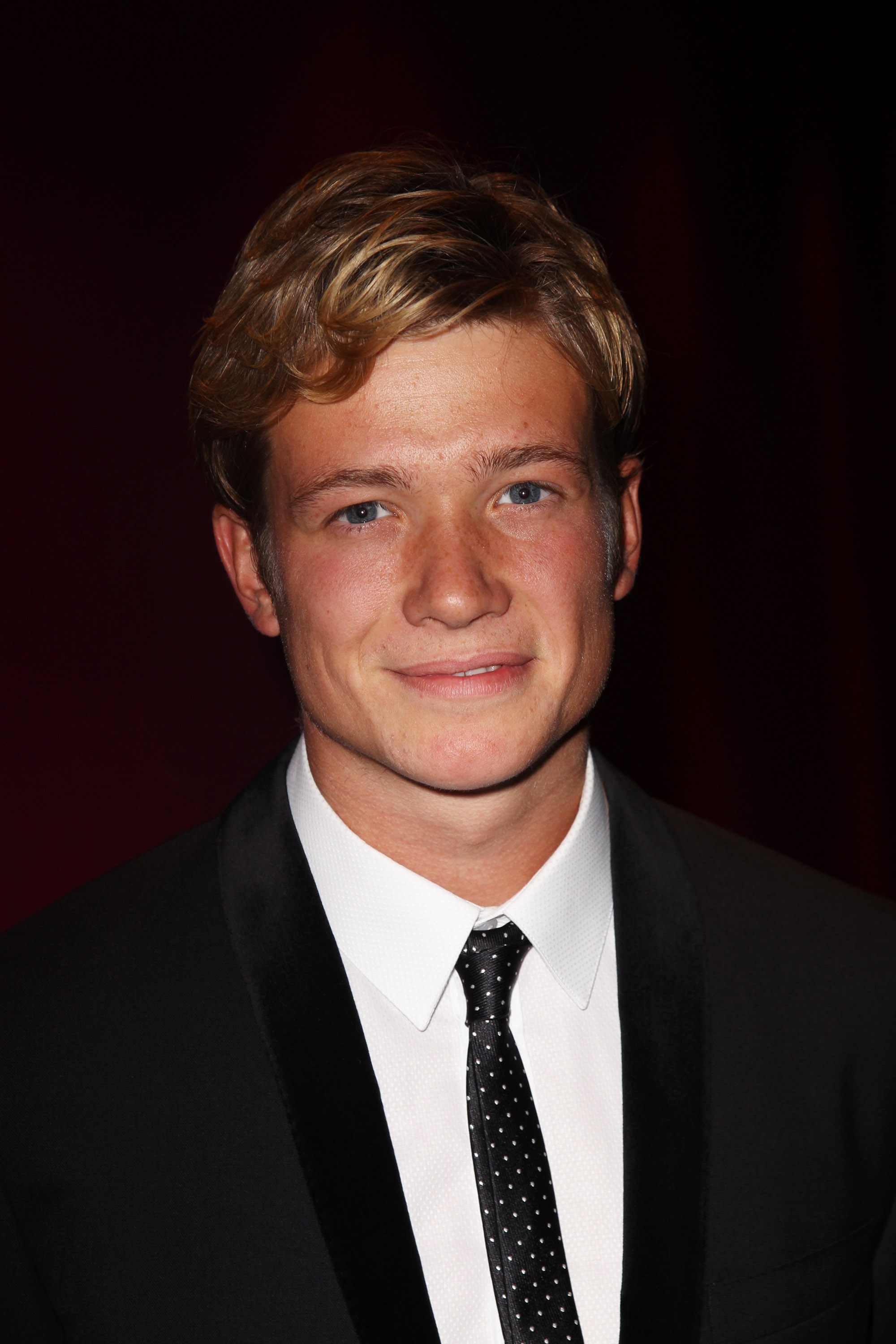 Ed Speleers attended the 2011 premiere of "A Lonely Place to Die" in London looking fresh-faced and youthful in a classic black tuxedo with a white shirt and polka-dot tie. With tousled blonde hair and a boyish charm, he embodied the early promise of a rising star.