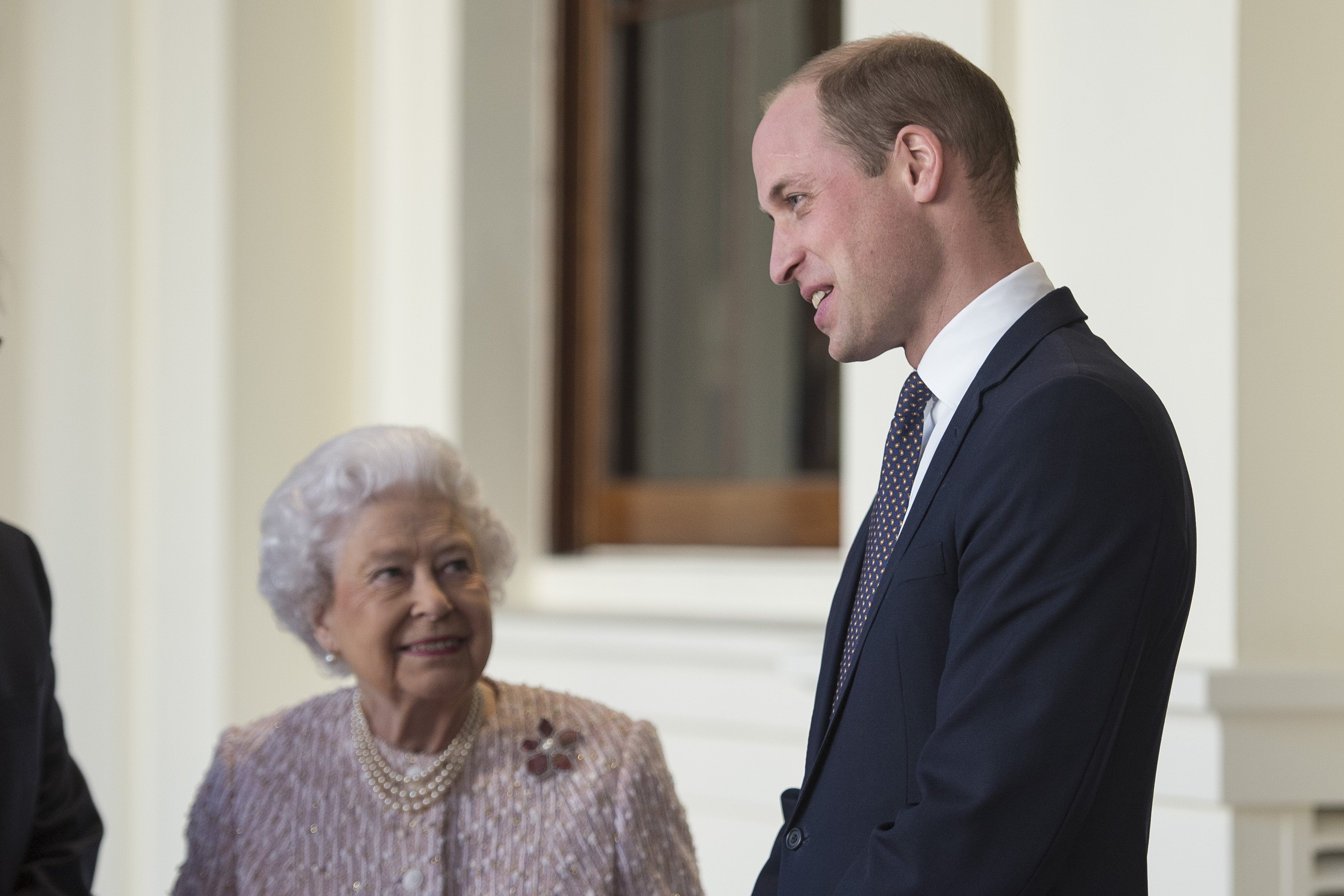 Queen Elizabeth II and Prince William at Buckingham Palace on November 28, 2017 in London, United Kingdom ┃Source: Getty Images