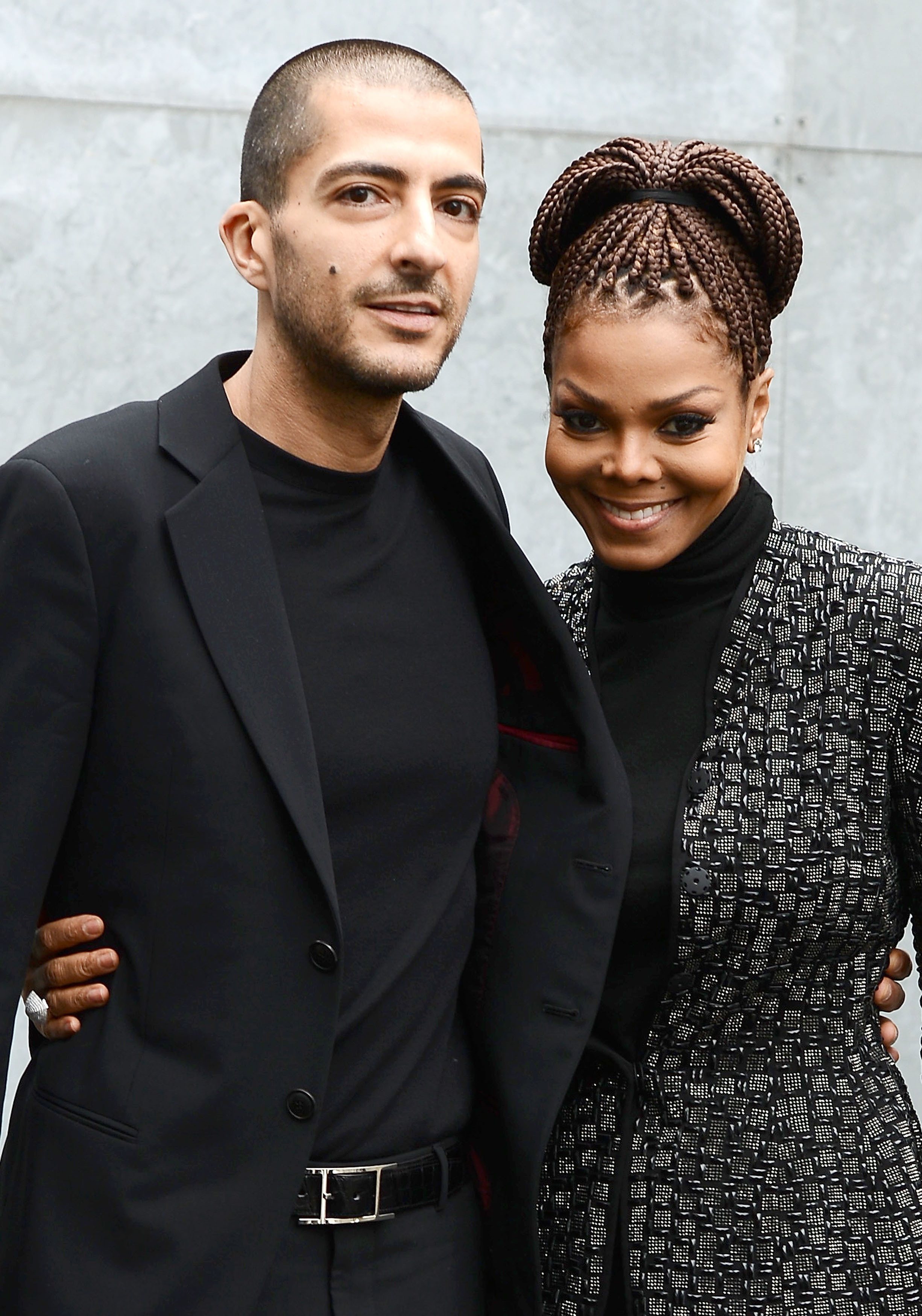 Wissam al Mana and Janet Jackson at the Giorgio Armani fashion show during Milan Fashion Week Womenswear Fall/Winter 2013/14 on February 25, 2013, in Milan, Italy | Source: Getty Images