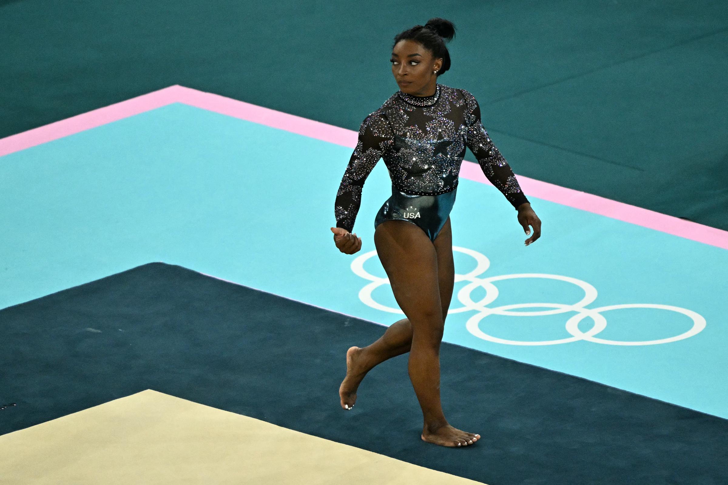 Simone Biles arrives for the floor exercise event during the artistic gymnastics women's qualification at the Paris 2024 Olympics on July 28, 2024 | Source: Getty Images