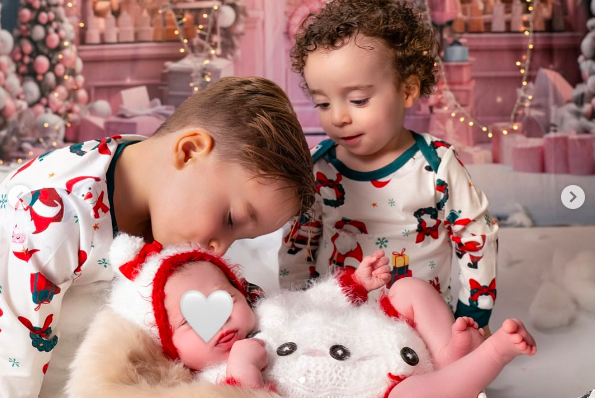Rute Cardoso and Diogo Jota's three kids sharing a sweet moment with each other, posted on December 25, 2024. | Source:  Instagram/rutecfcardoso14