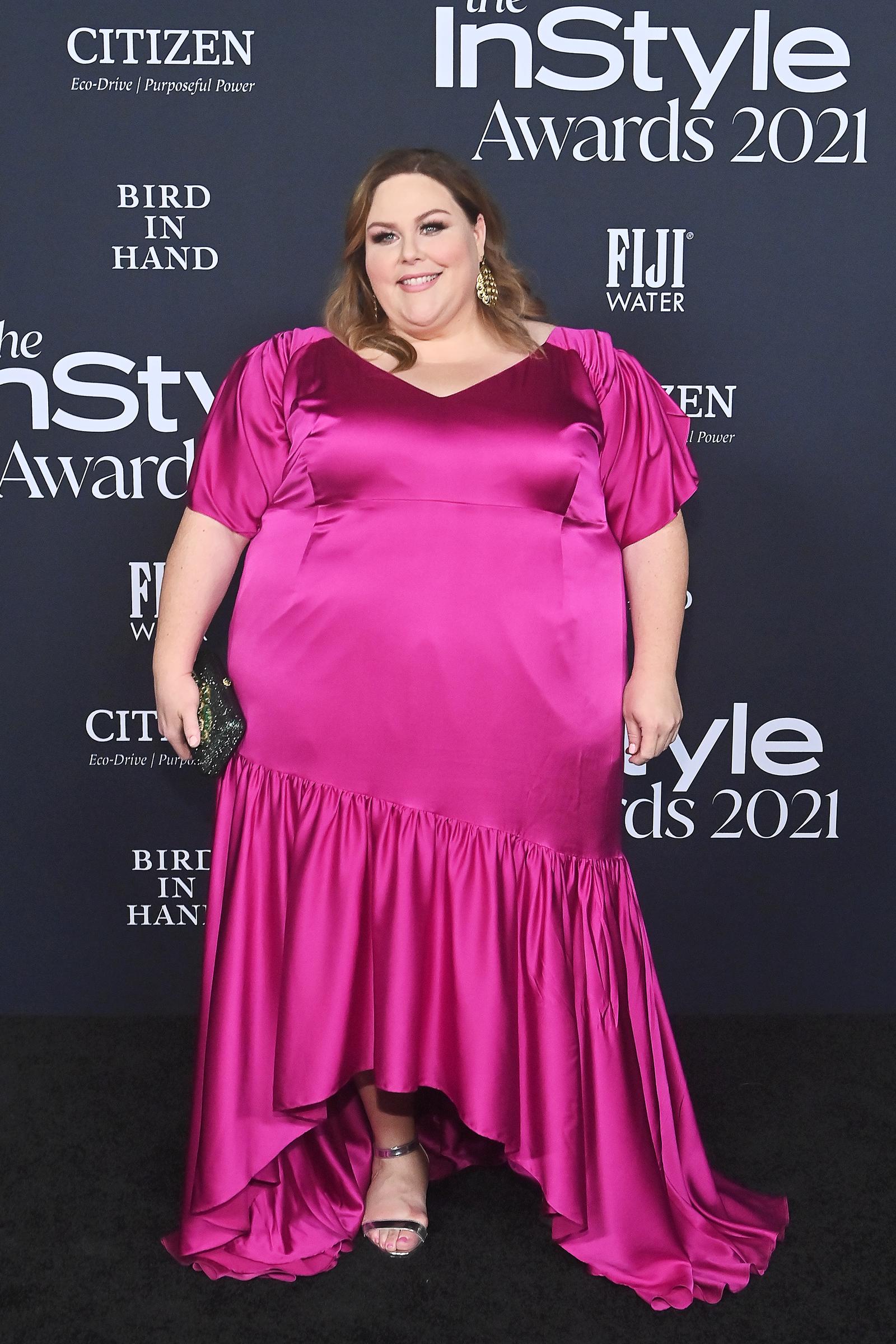 A vivid fuchsia satin gown with puffed sleeves stood out at the InStyle Awards. The photo shows Metz several years before she confirmed using a GLP-1 medication.