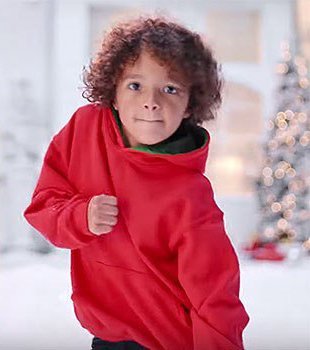 Mariah Carey's son Morocco in the new video "All I Want For Christmas Is You"/ Source: YouTube/ Mariah Carey