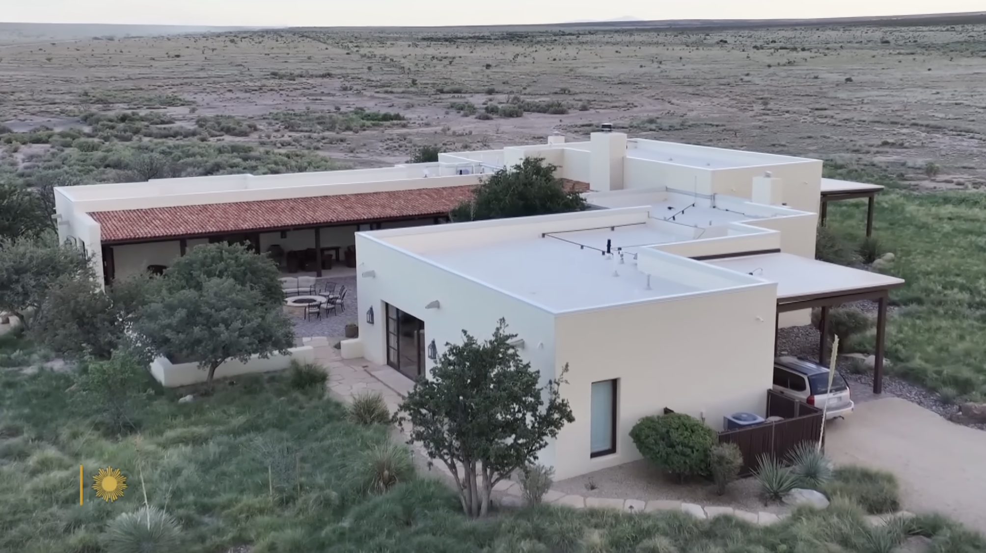 An isolated desert estate sits surrounded by rugged terrain on one of the vast properties connected to Ted Turner’s ranch empire. | Source: YouTube/CBS Sunday Morning
