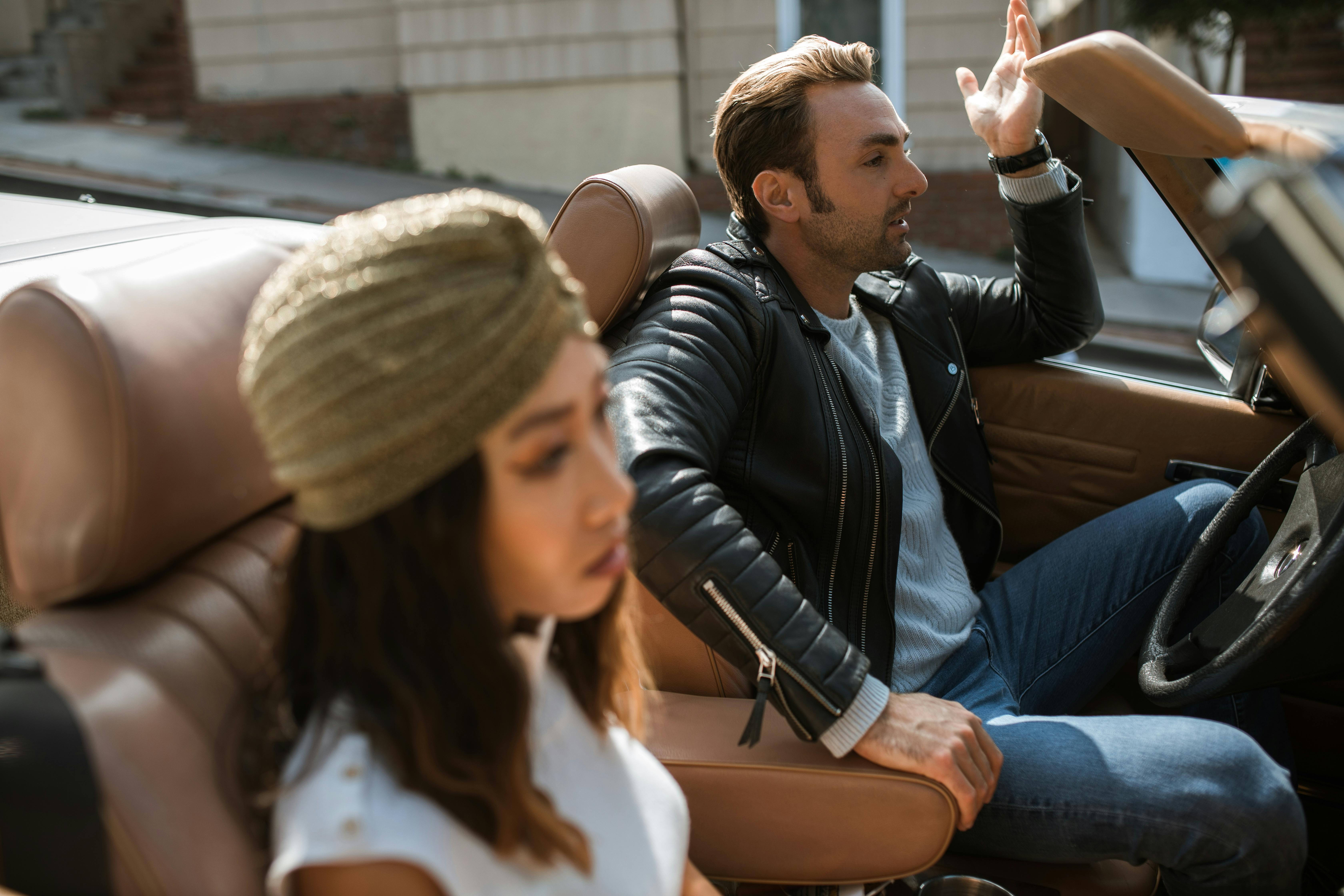 A couple arguing in a car | Source: Pexels