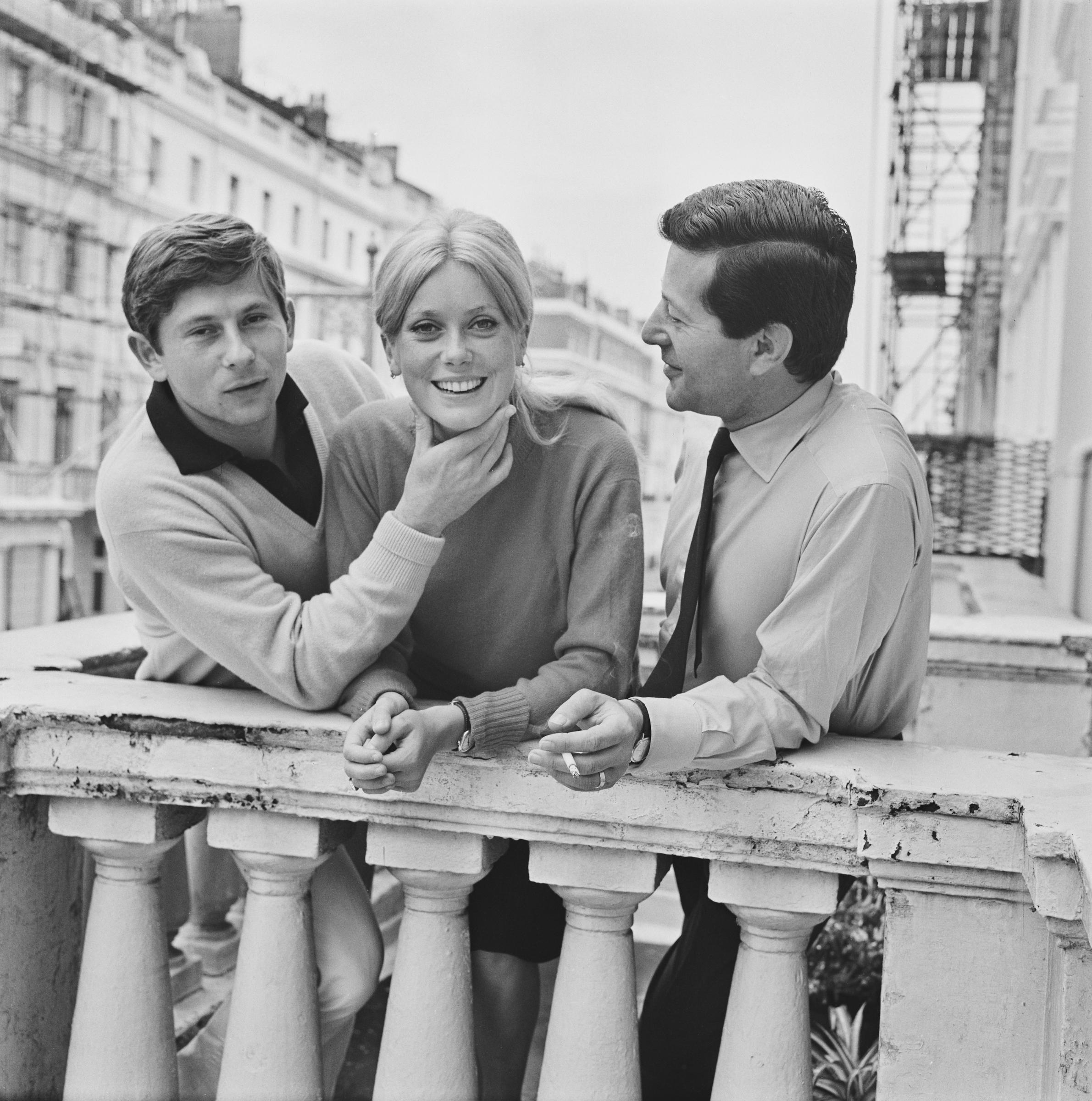 The famous actress with film director Roman Polanski and producer Gene Gutowski during the filming of 