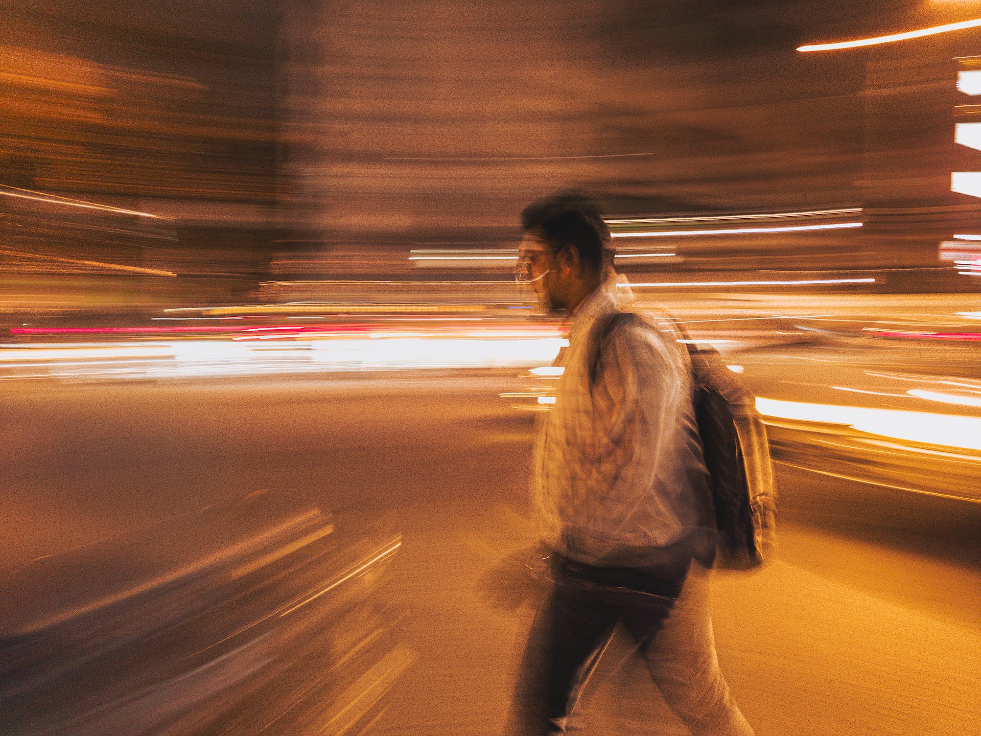 A blurred photo of a person walking | Source: Pexels