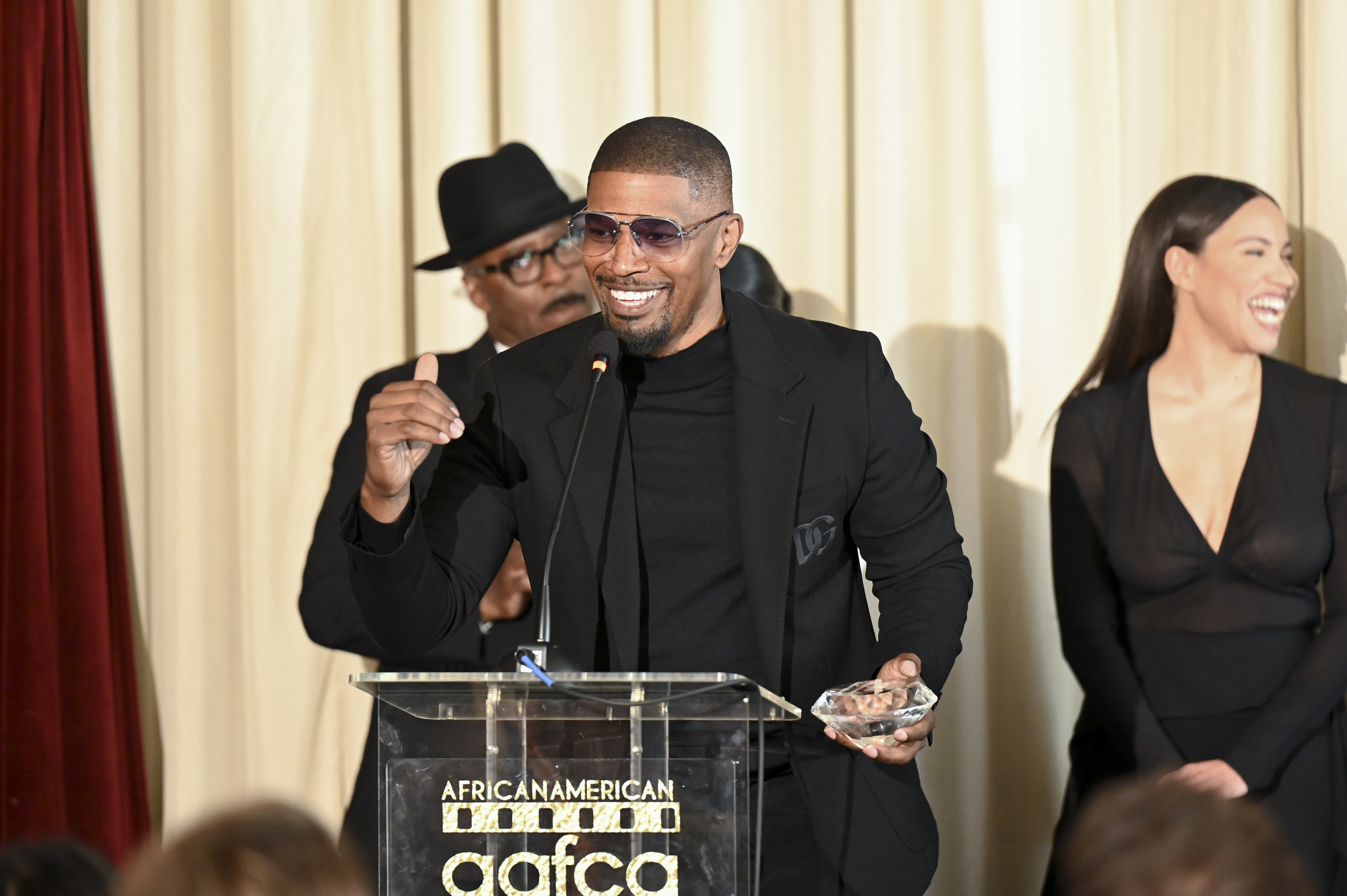 Courtney B. Vance, Jamie Foxx, and Jurnee Smollett at the AAFCA Special Achievement Honorees Luncheon in Los Angeles, California on March 3, 2024 | Source: Getty Images