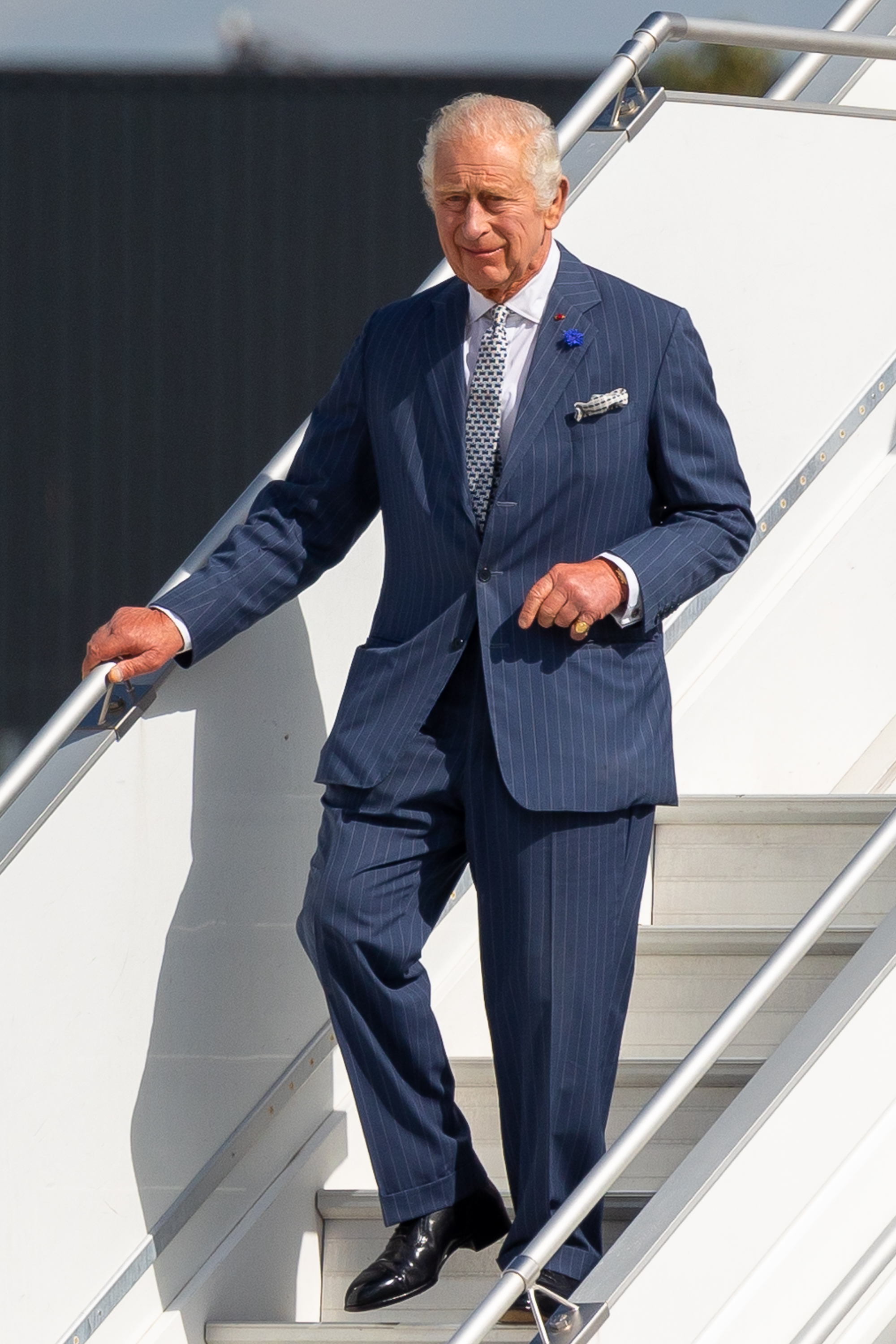 King Charles III getting off a plane as he arrives for a state visit to France in Paris, France on September 20, 2023 | Source: Getty Images