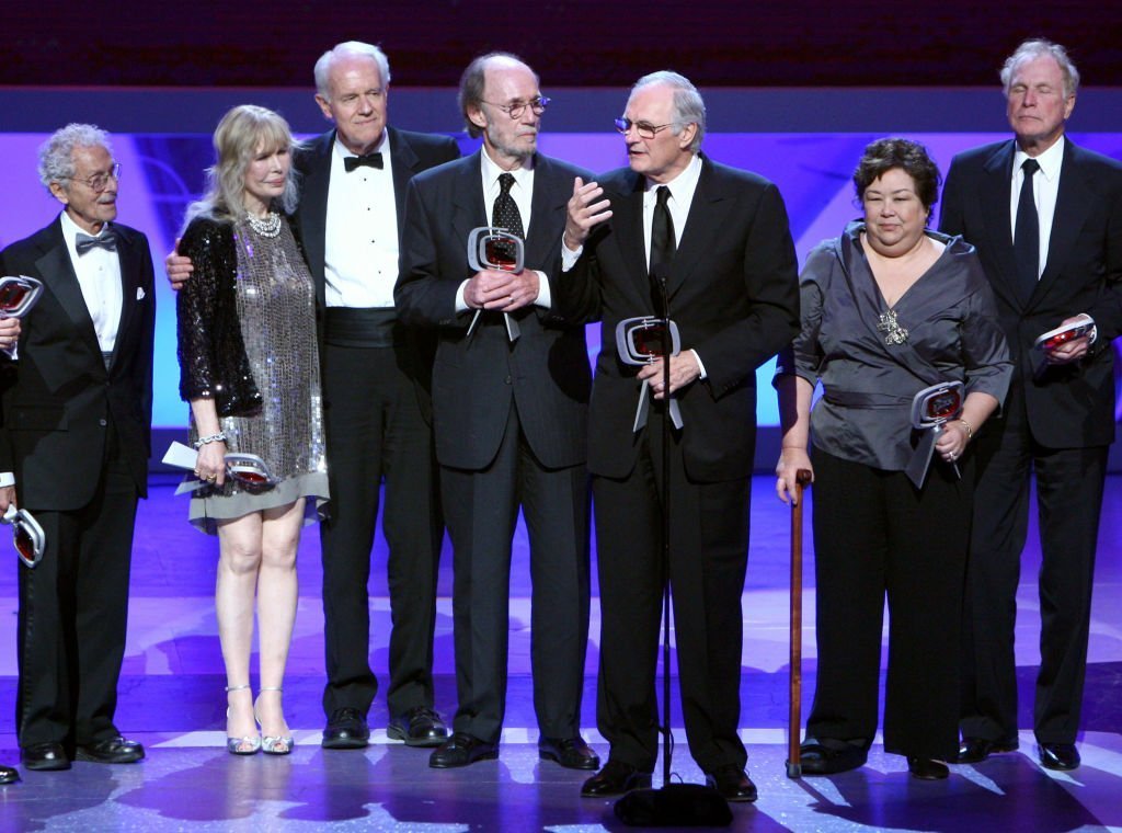 Allan Arbus, Loretta Swit, Mike Farrell, Burt Metcalfe, Alan Alda, Kellye Nakahara Wallet, and Wayne Rogers accept the impact award for "M*A*S*H" onstage at the 7th Annual TV Land Awards held at Gibson Amphitheatre  | Getty Images
