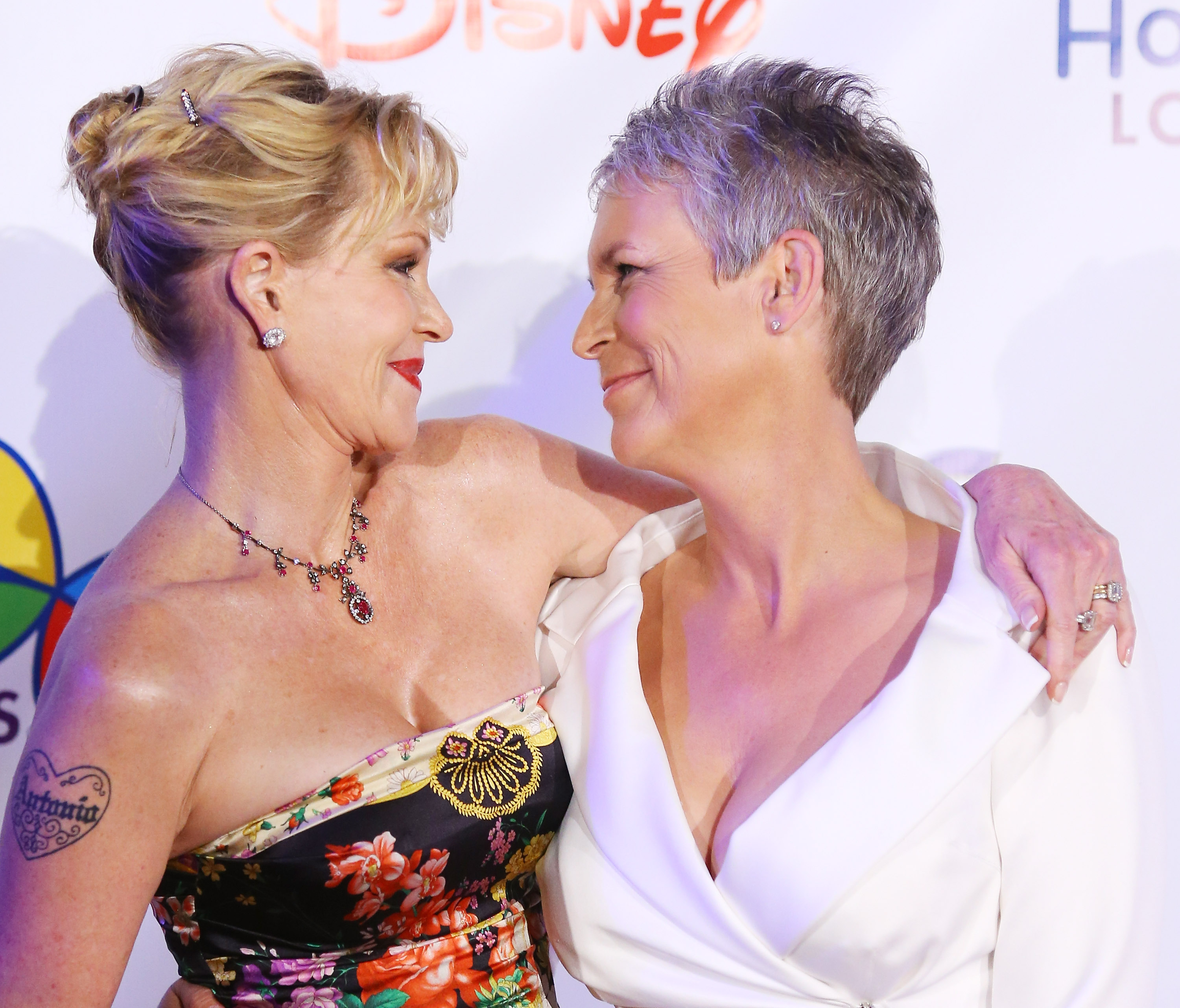 Melanie Griffith and Jamie Lee Curtis at Children's Hospital Los Angeles Gala: Noche de Ninos at L.A. Live Event Deck in Los Angeles, California, on October 20, 2012. | Source: Getty Images