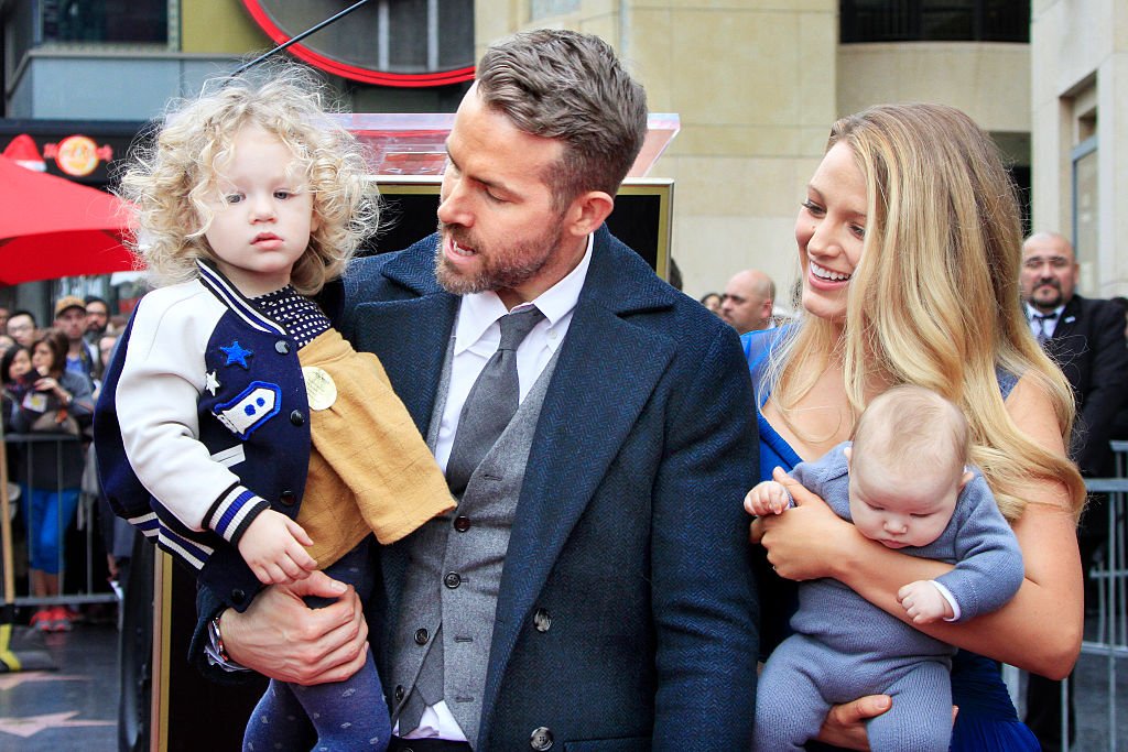 Ryan Reynolds, Blake Lively, and their daughters at a ceremony as Ryan Reynolds is honored with a star on the Hollywood Walk of Fame on December 15, 2016 | Source: Getty Images