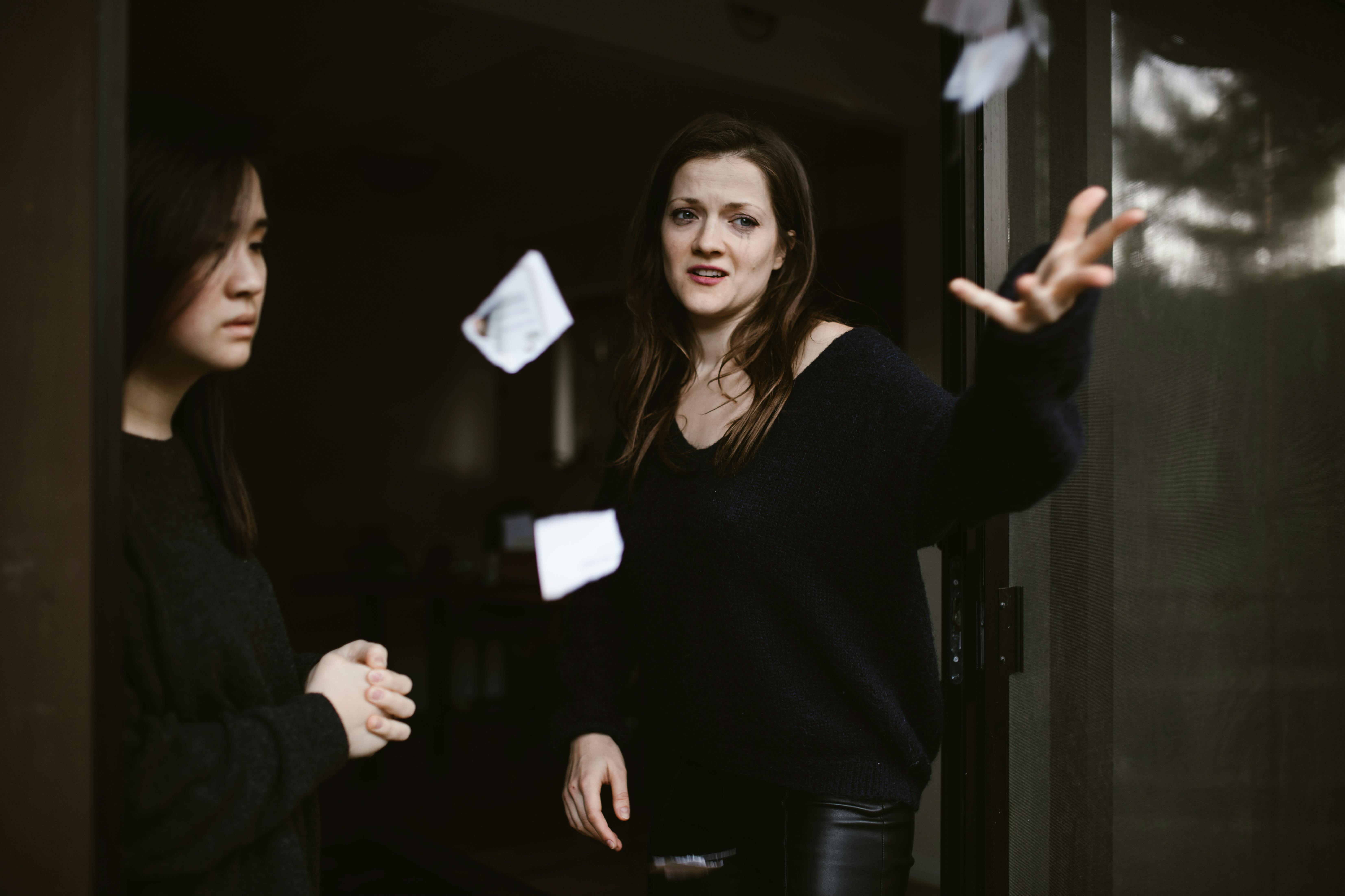 Women standing by the door | Source: Pexels