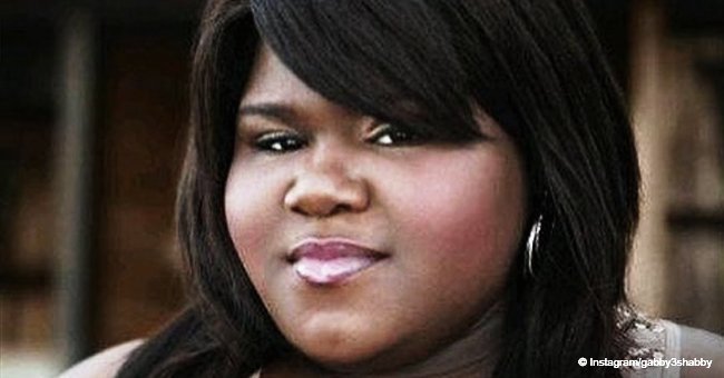 Gabby Sidibe stuns in simple black dress in pic with Michelle & Barack Obama