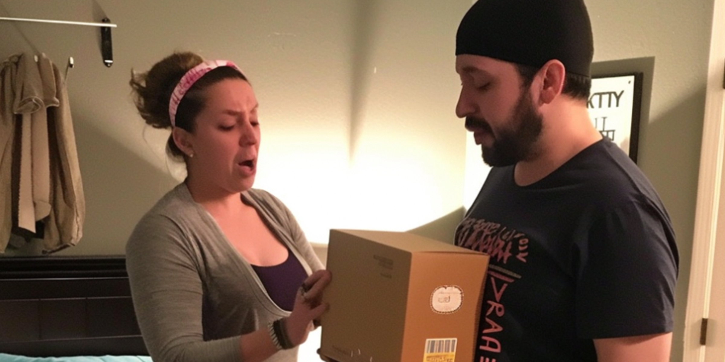 A woman yelling at a man holding a box | Source: Amomama