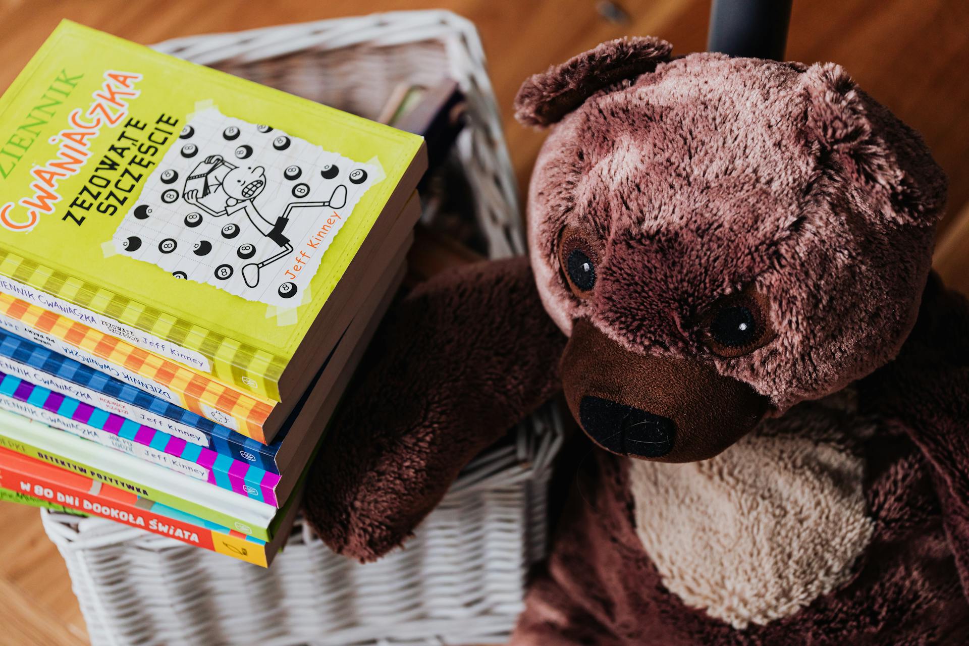 Children's books and a teddy bear | Source: Pexels