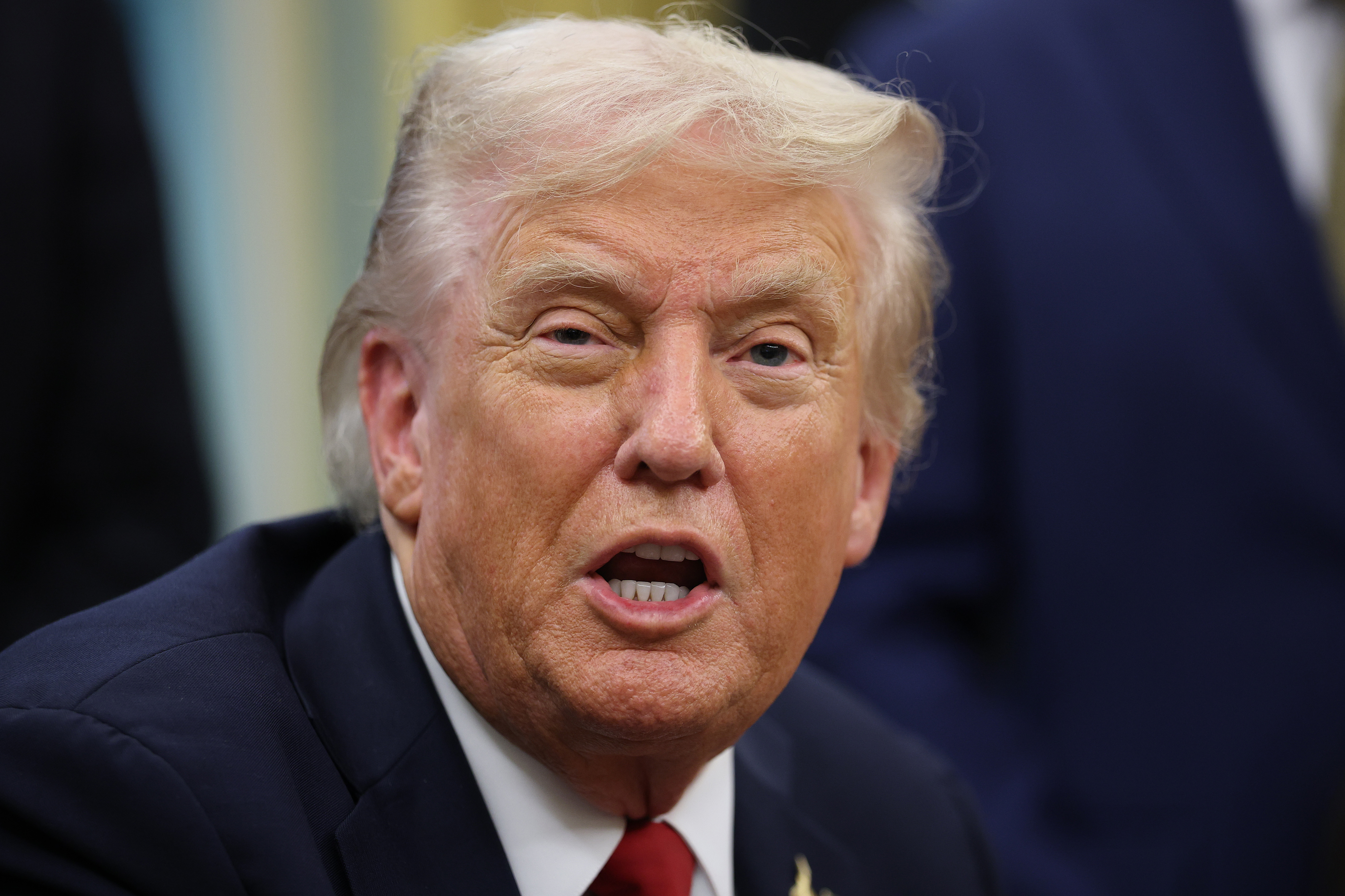U.S. President Donald Trump speaking during an executive order signing at the White House in Washington, D.C., on September 30, 2025. | Source: Getty Images