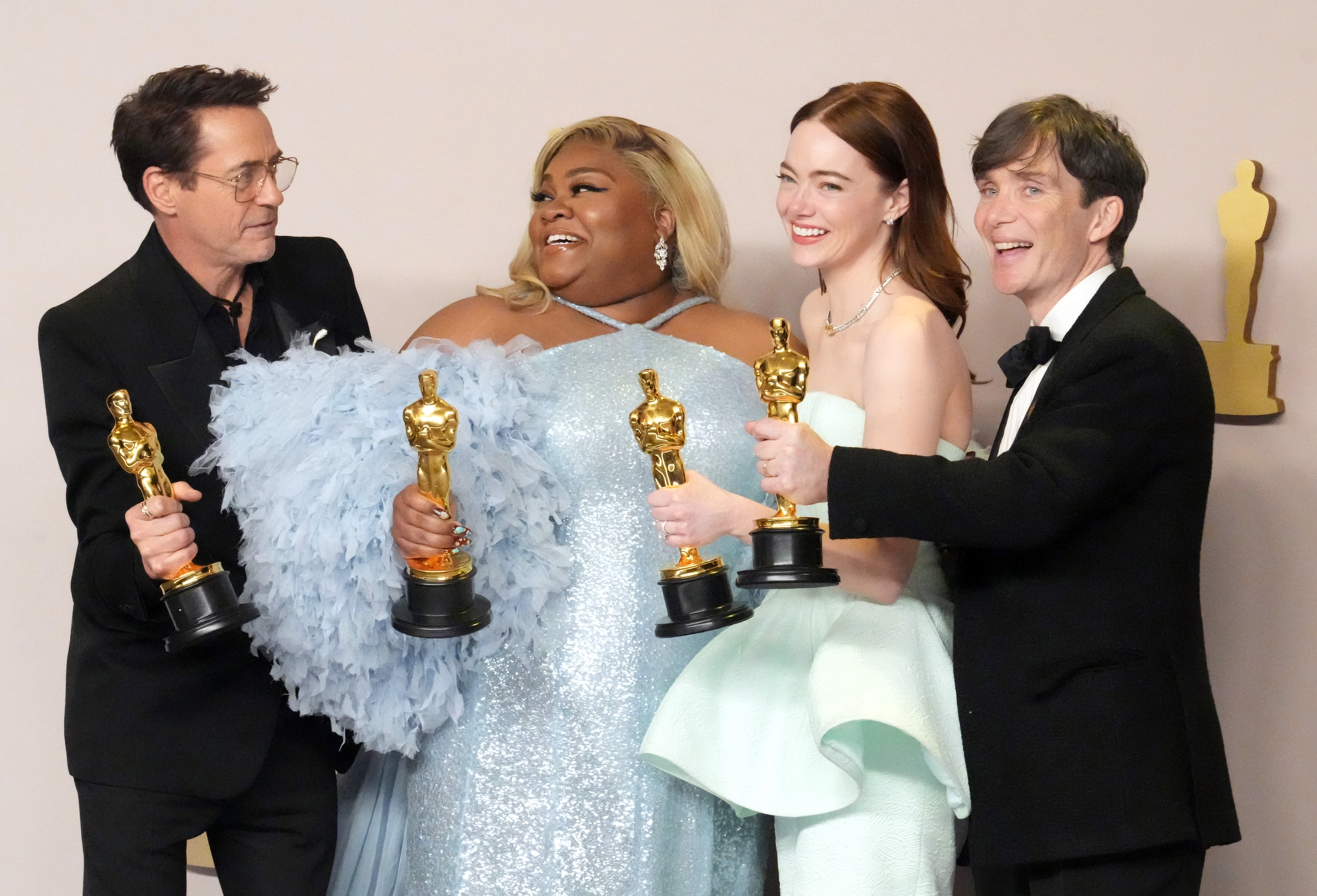 Robert Downey Jr., Da'Vine Joy Randolph, Emma Stone, and Cillian Murphy pictured onstage in the press room at the 96th Annual Academy Awards at Ovation Hollywood on March 10, 2024 in Hollywood, California. | Source: Getty Images