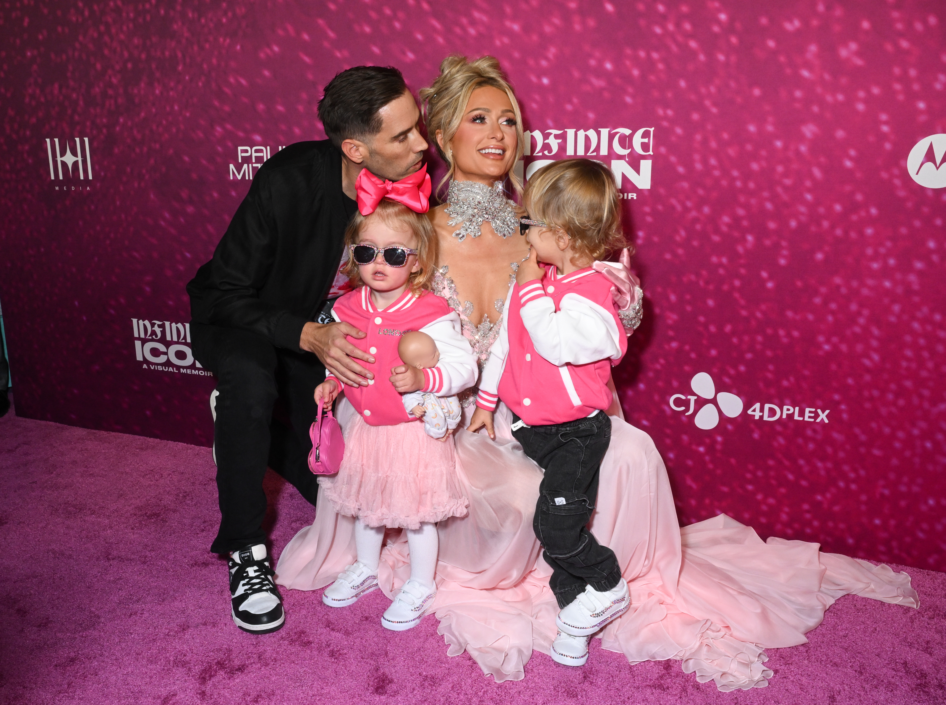 Carter Reum, Paris Hilton, London Marilyn Hilton Reum and Phoenix Barron Hilton Reum during the "Infinite Icon: A Visual Memoir" Los Angeles premiere at AMC The Grove 14 on January 20, 2026, in Los Angeles, California | Source: Getty Images