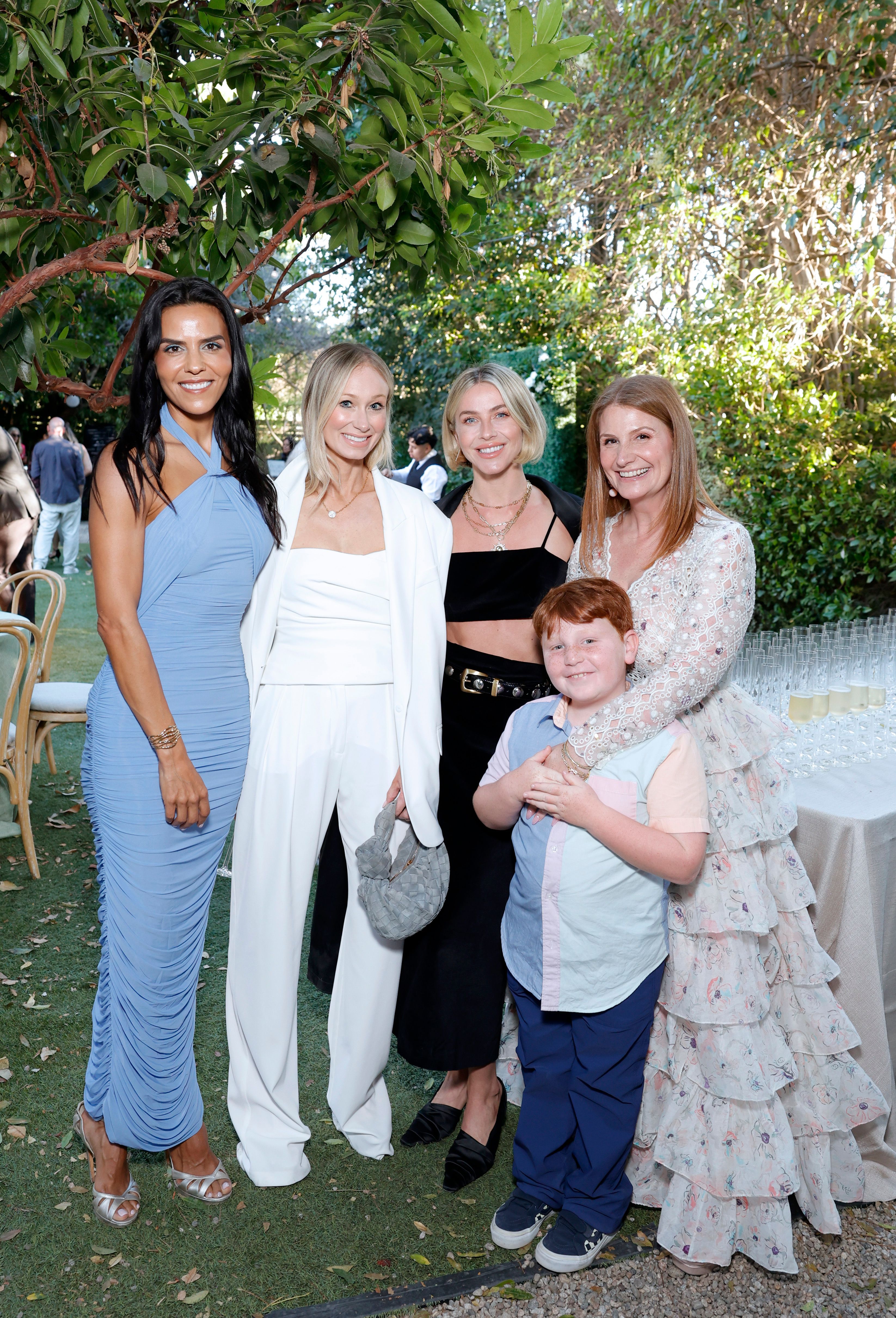 (L-R) Elsa Marie Collins, Stephanie Levinson, Julianne Hough, and guest pictured with Zoe Winkler Reinis and son at the TIAH 6th Anniversary Soiree on August 24, 2024, in Los Angeles, California. | Source: Getty Images