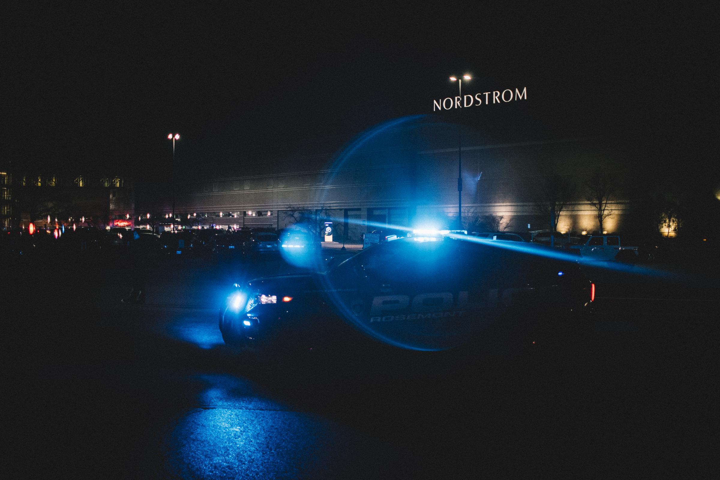 A police cruiser in the parking lot of Oakbrook Mall in Oak Brook, Illinois, on December 23, 2021 | Source: Getty Images