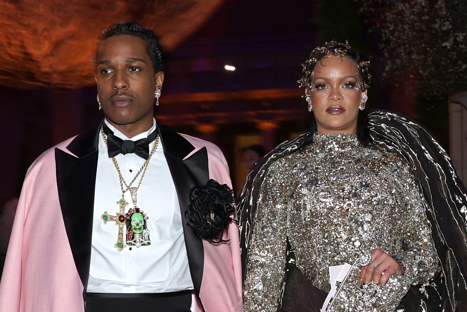 Rihanna looks ahead while A$AP Rocky glances sideways in New York City on May 4, 2026 | Source: Getty Images