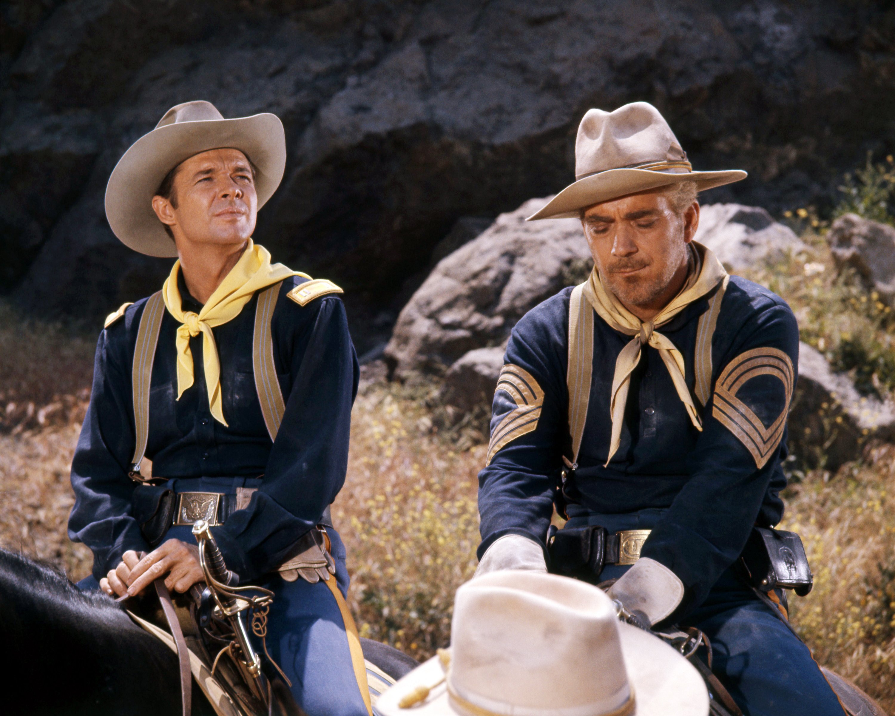 American actor Audie Murphy as Captain Bruce Coburn, and Robert Brubaker as Sergeant Walker, in '40 Guns To Apache Pass', directed by William Witney, circa 1967 | Source: Getty Images