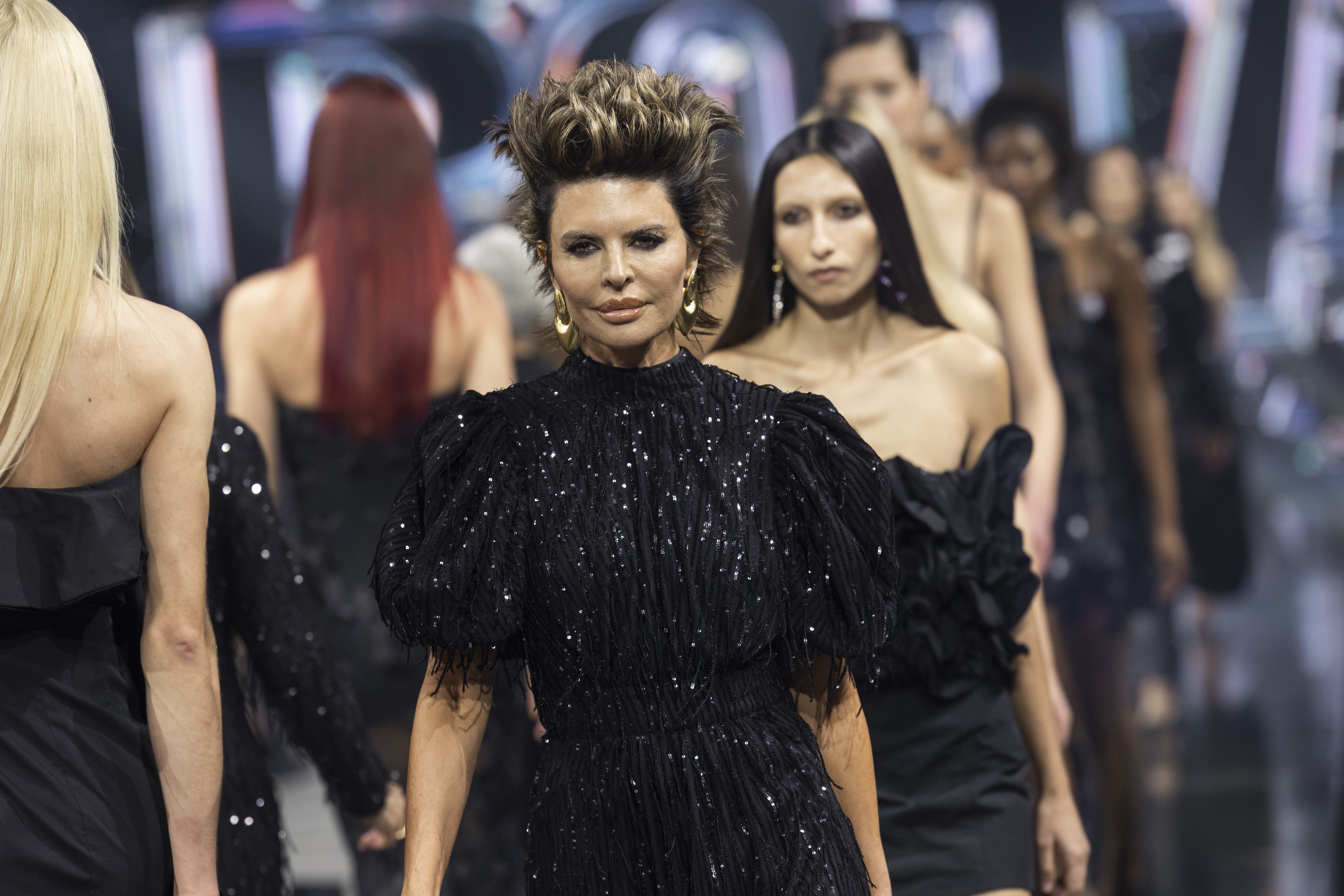 Lisa Rinna walks the runway at the Rotate show during Copenhagen Fashion Week 2023 in Denmark on February 2. | Source: Getty Images