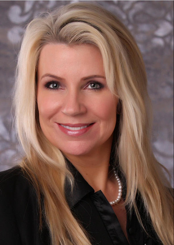 Dina Norris DiCiolli poses for a polished portrait, her soft smile and poised expression framed by sleek blonde hair and subtle elegance. | Source: Facebook/DinaDiCiolli